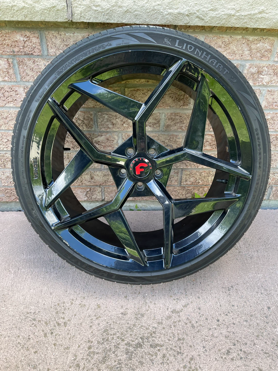 Set of 4 Black Lexani Wheels with Lionhart Tires