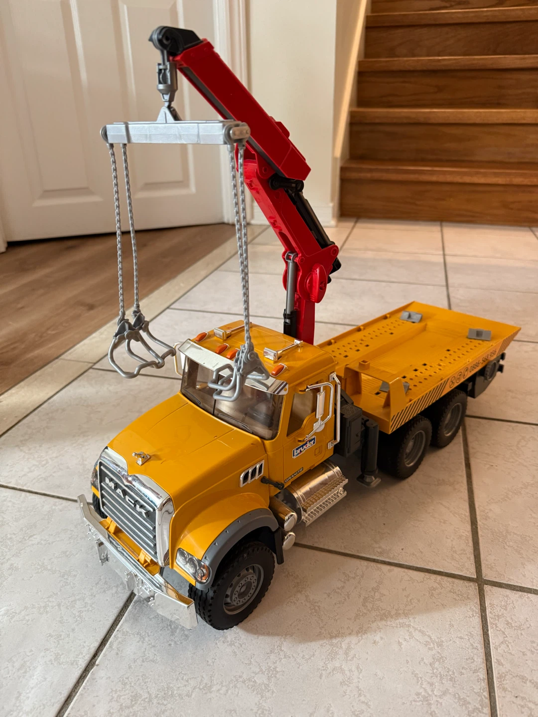 Bruder Mack Granite Flatbed Truck with Crane - photo 2