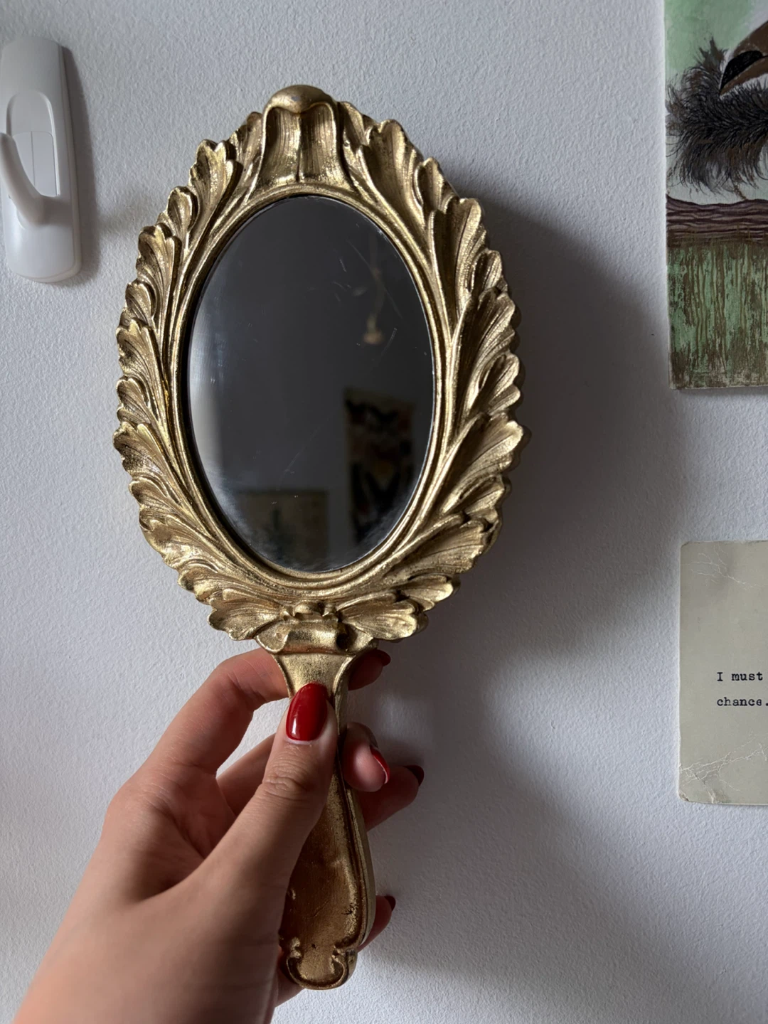 Ornate Golden handheld mirror