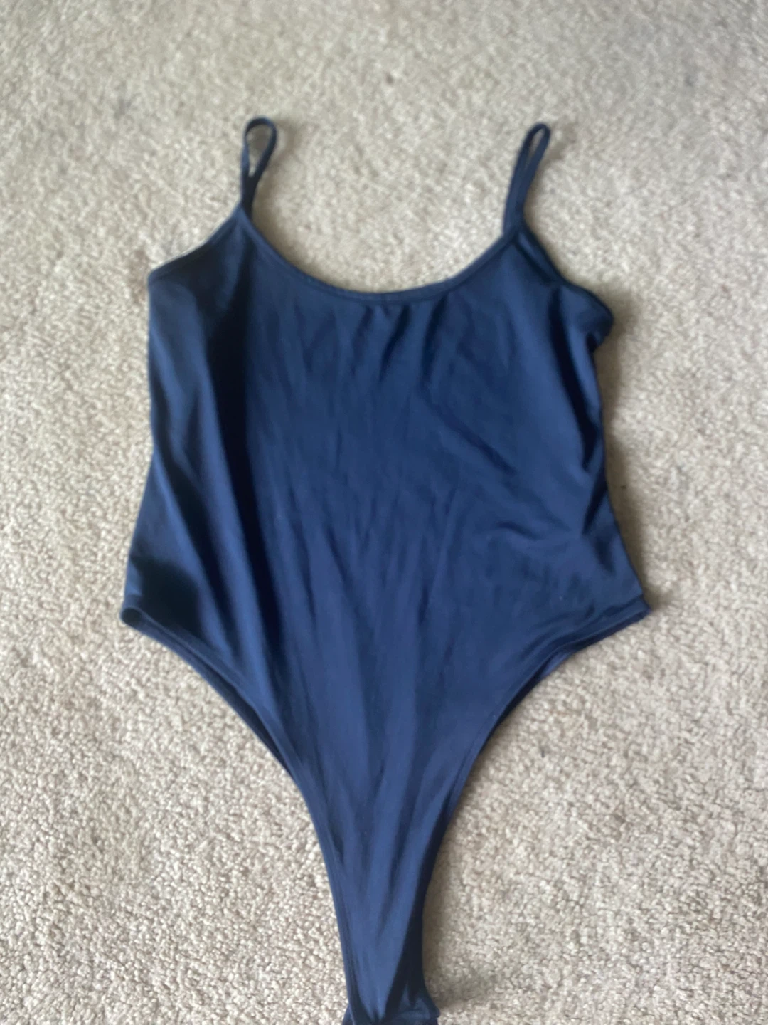 Dark blue body suit