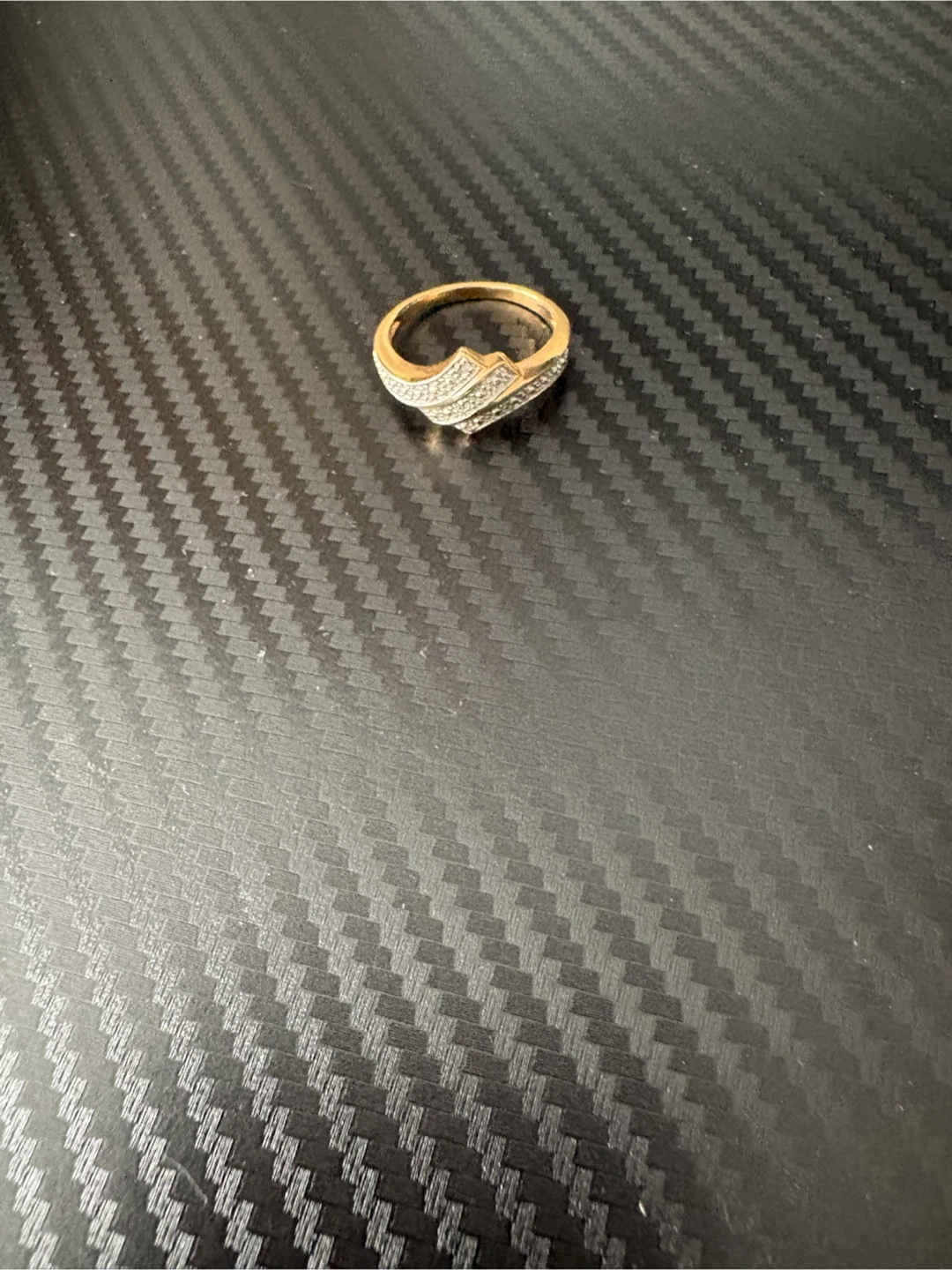 Gold-tone ring with clear stones