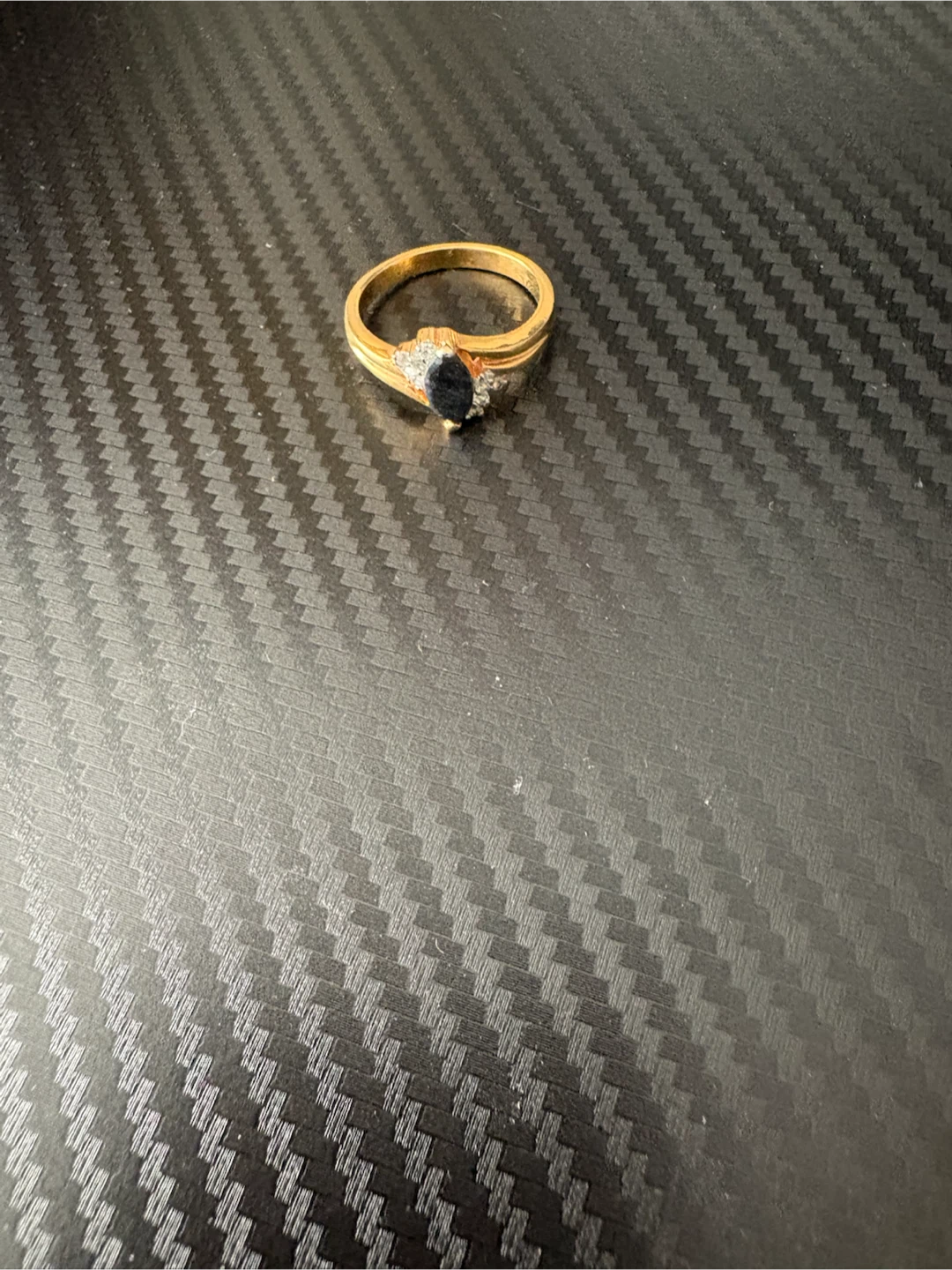 Gold ring with sapphire and diamonds
