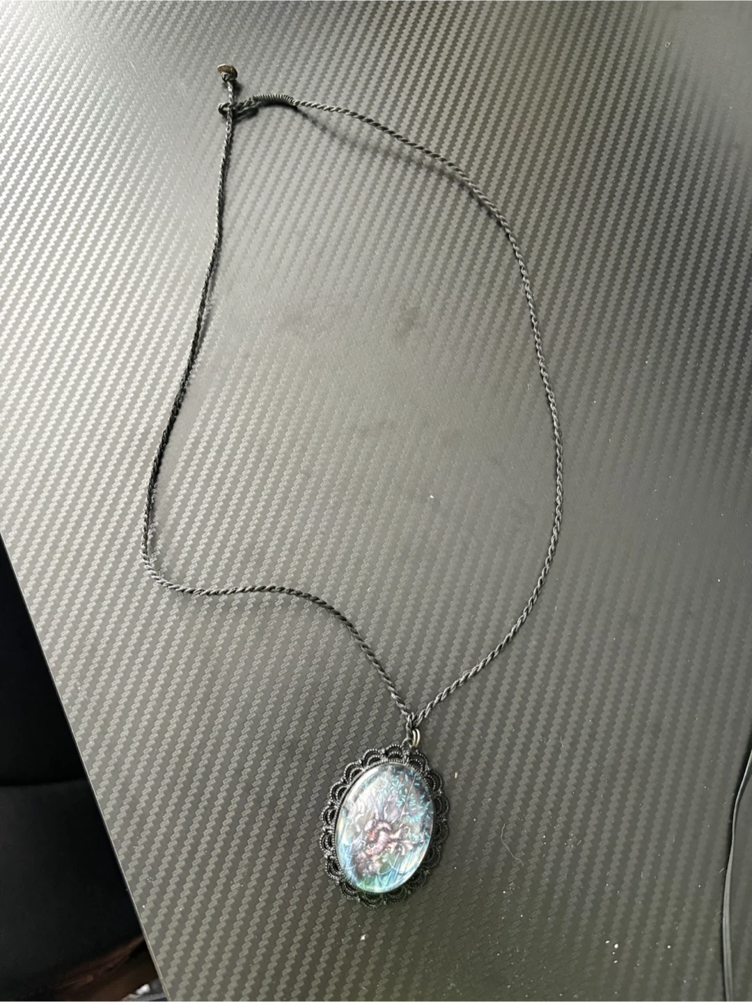 Oval Pendant Necklace with Intricate Design