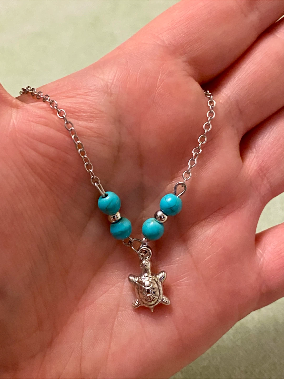 Silver Tone Turtle Charm Bracelet with Blue Beads