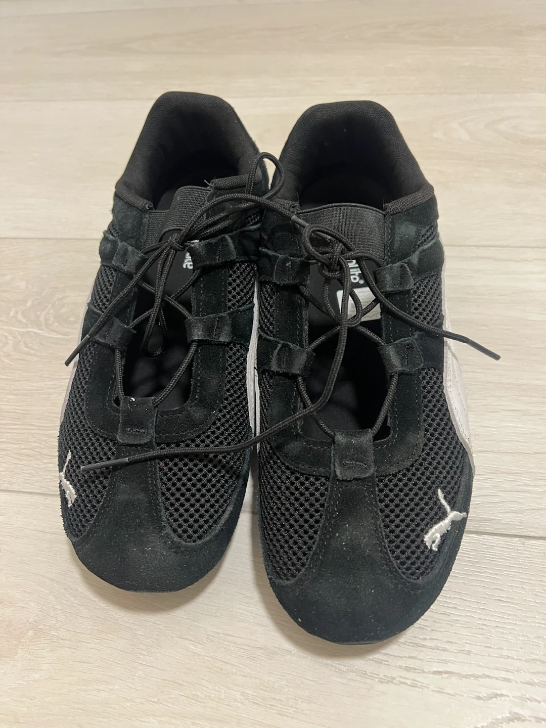 Puma black athletic shoes