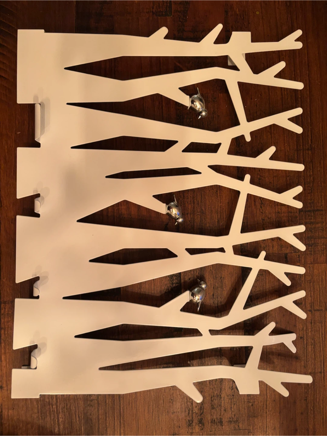 Umbra white wall-mounted jewelry rack with birds