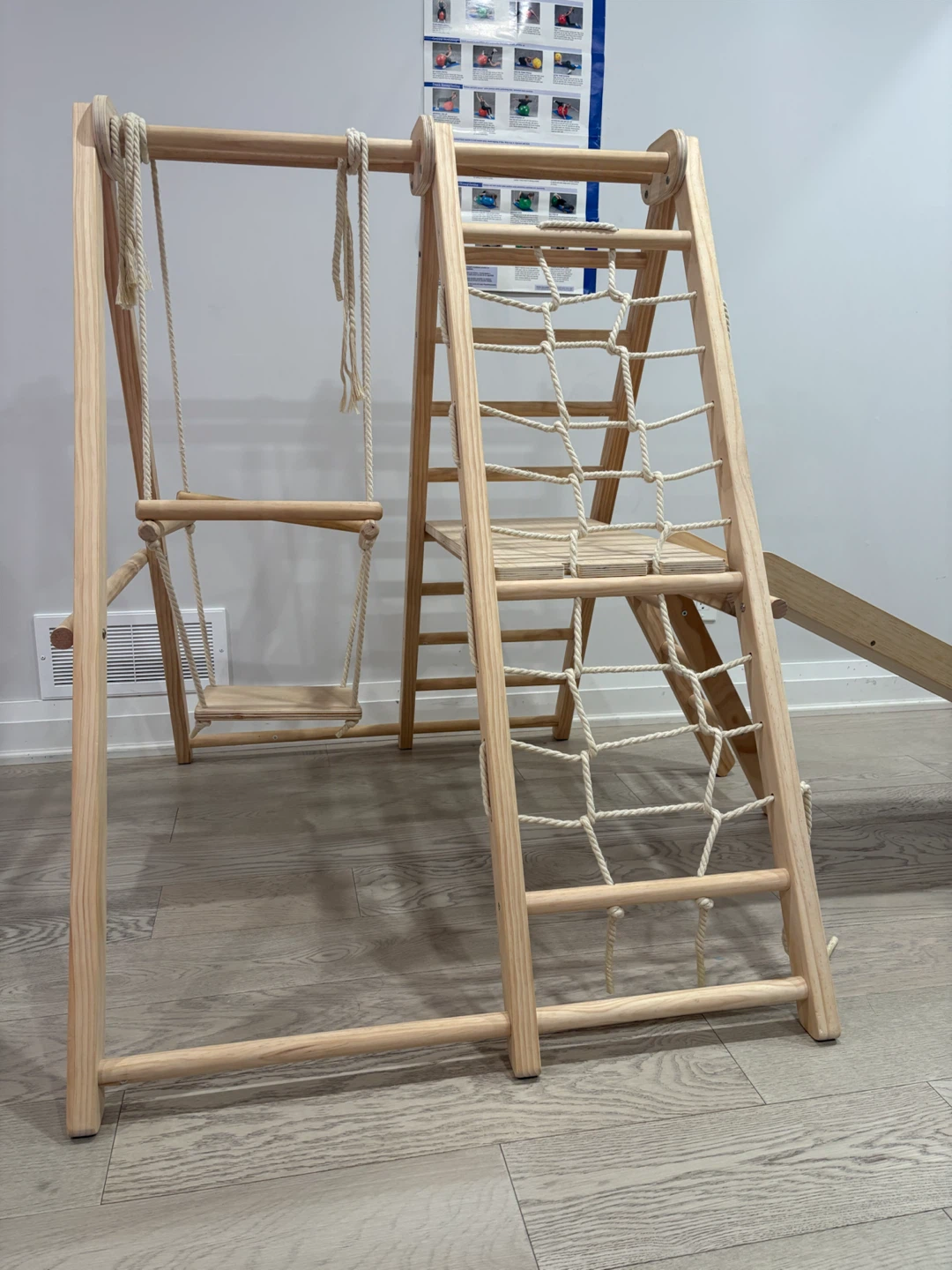 Indoor playground gym with a swing
