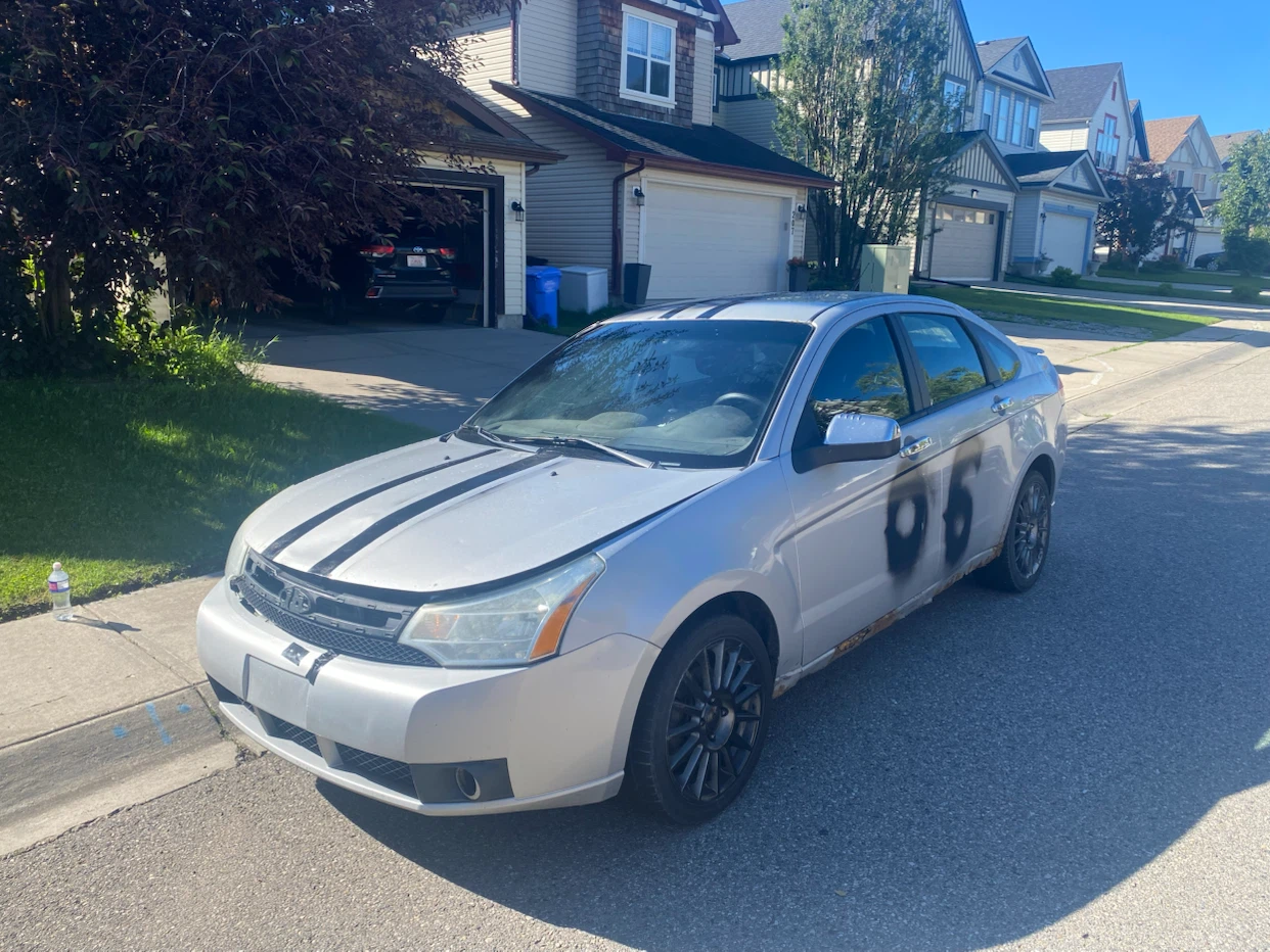 Silver Ford Focus Sedan - photo 2