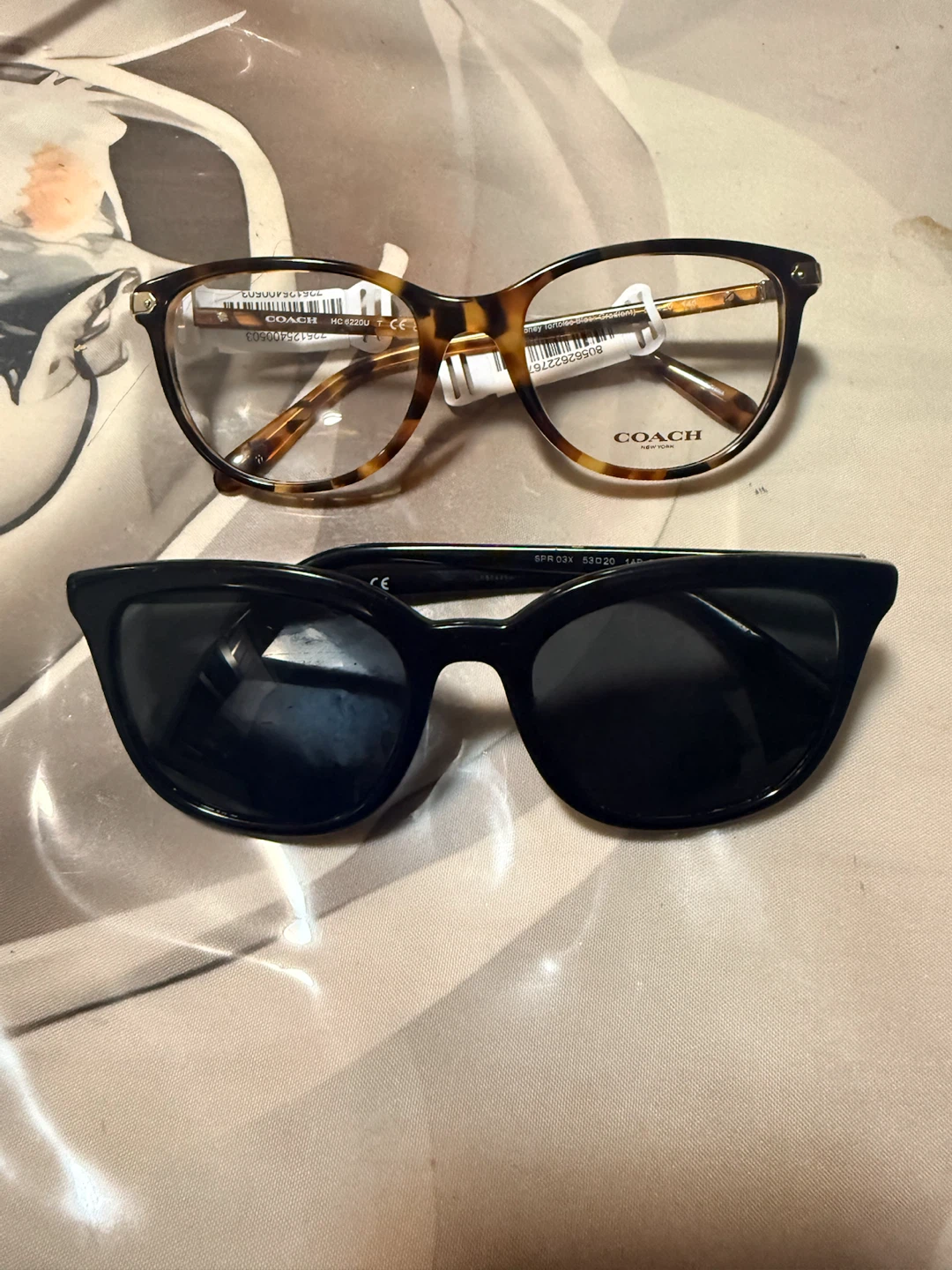 Prada Sunglasses & Coach Glasses