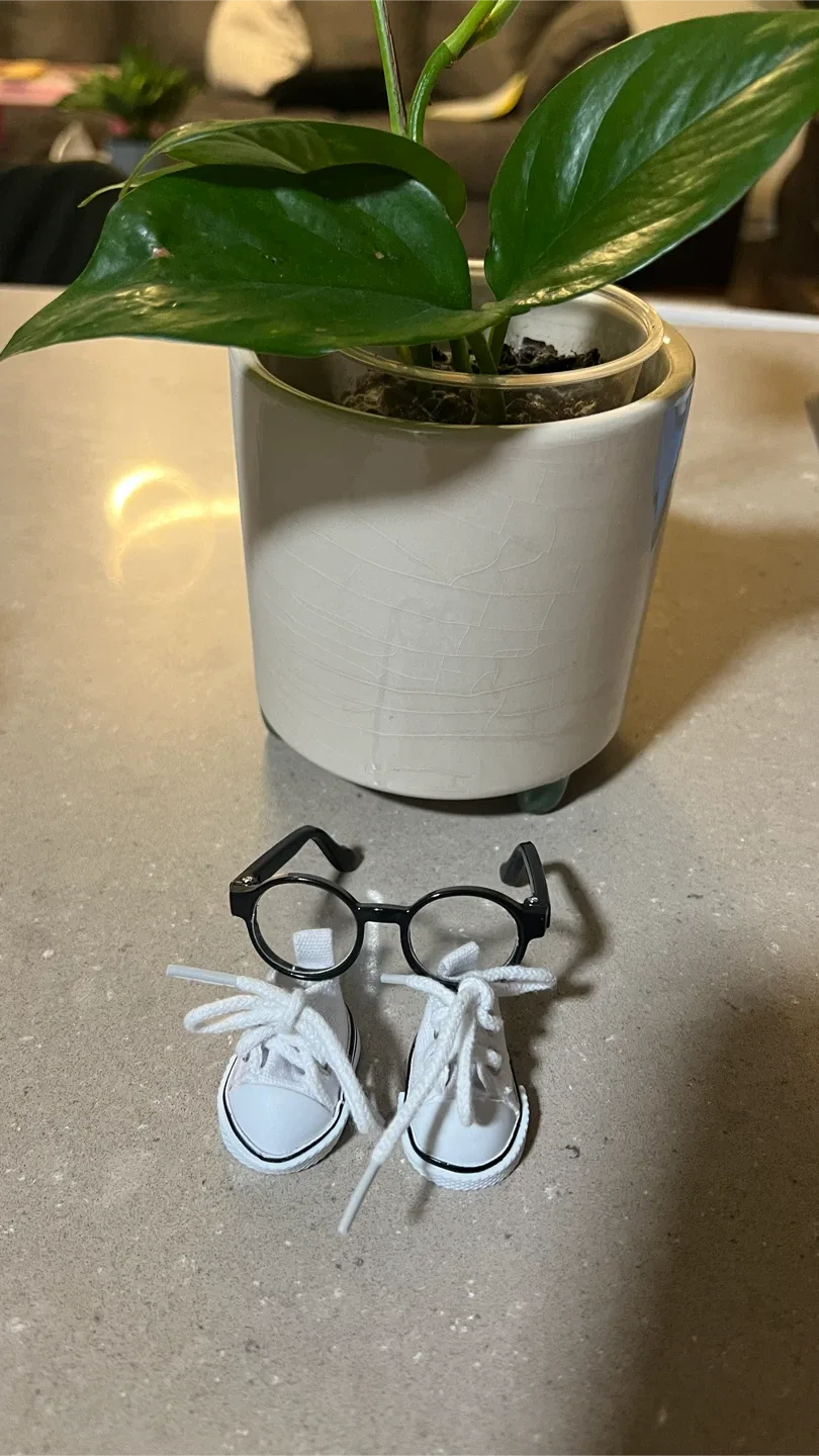 White miniature sneakers and black glasses - photo 3