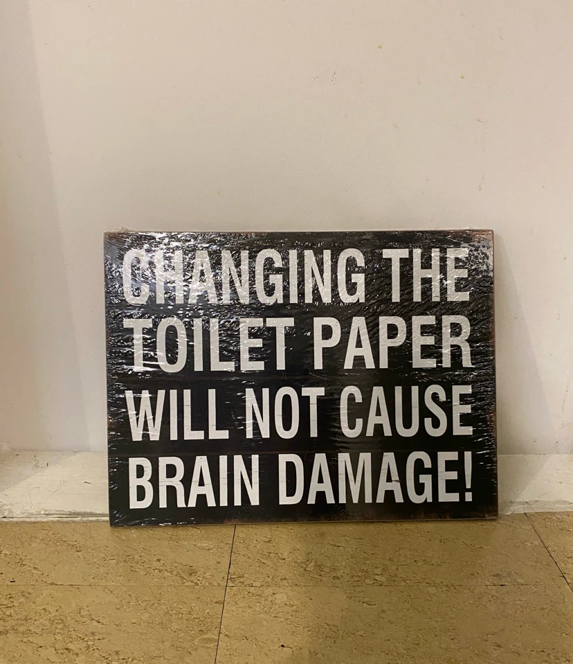Toilet paper sign