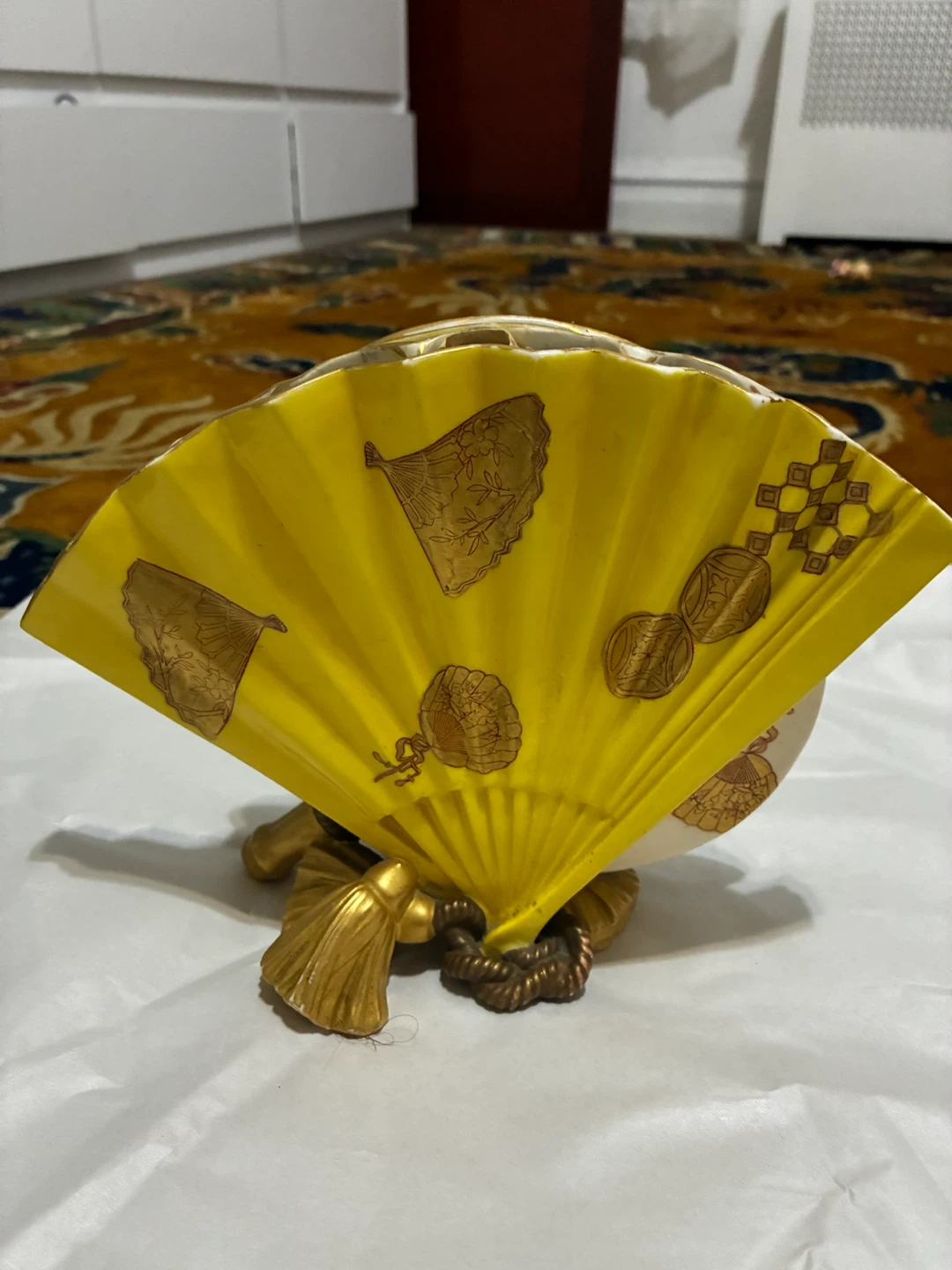 Decorative Yellow Fan with Gold Accents