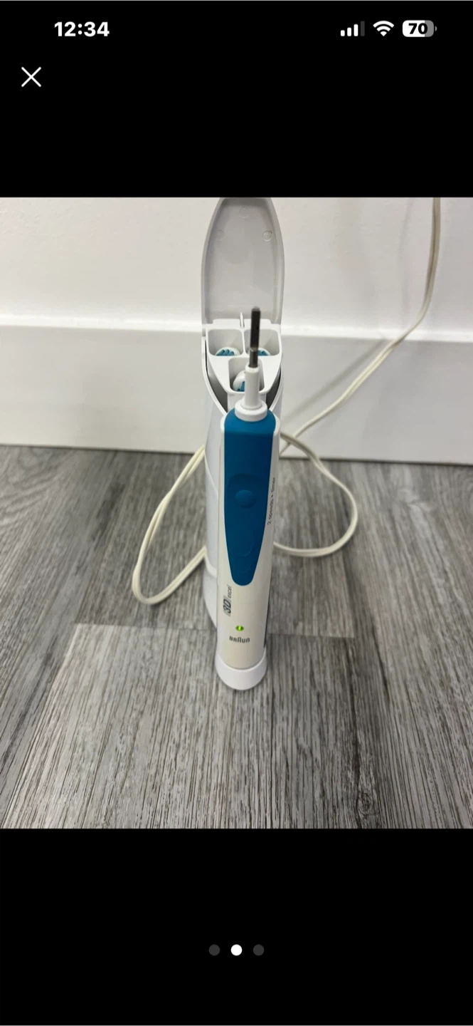 Braun Oral-B Electric Toothbrush with Charger and Brush Heads - photo 2