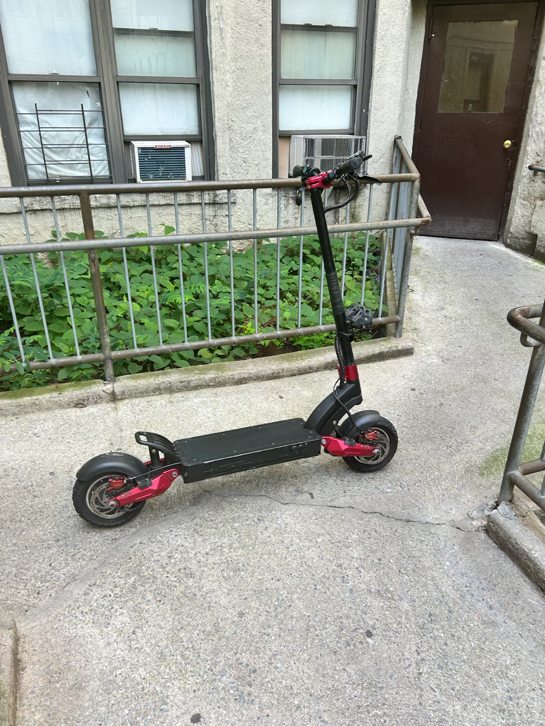 Black Electric Scooter with Red Accents