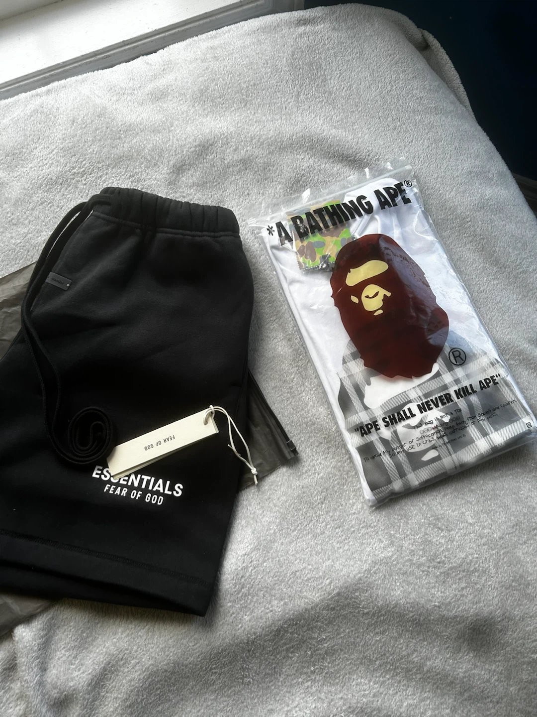 Essentials shorts and bape shirt
