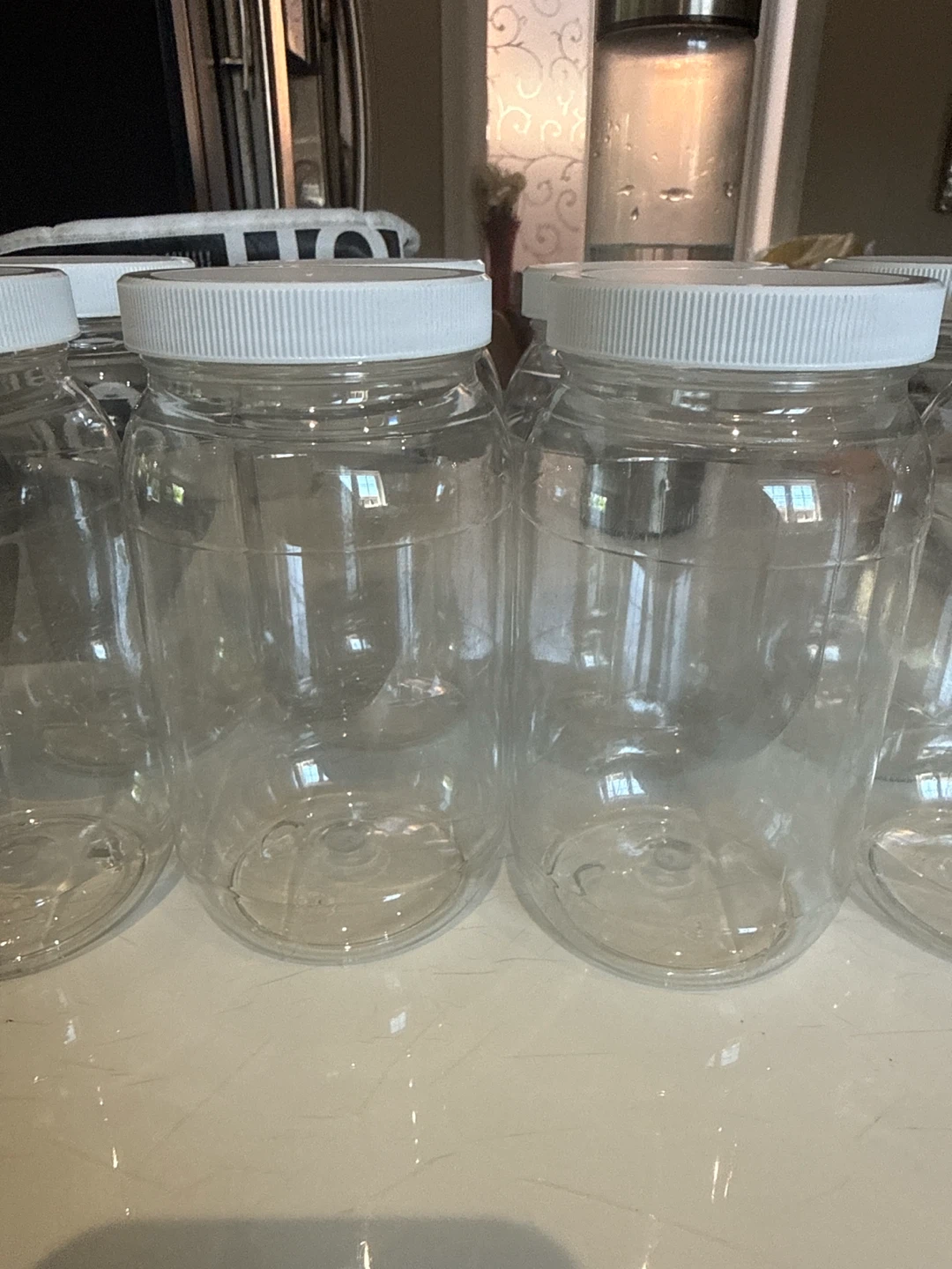 Set of 8 Clear Plastic Jars with White Lids