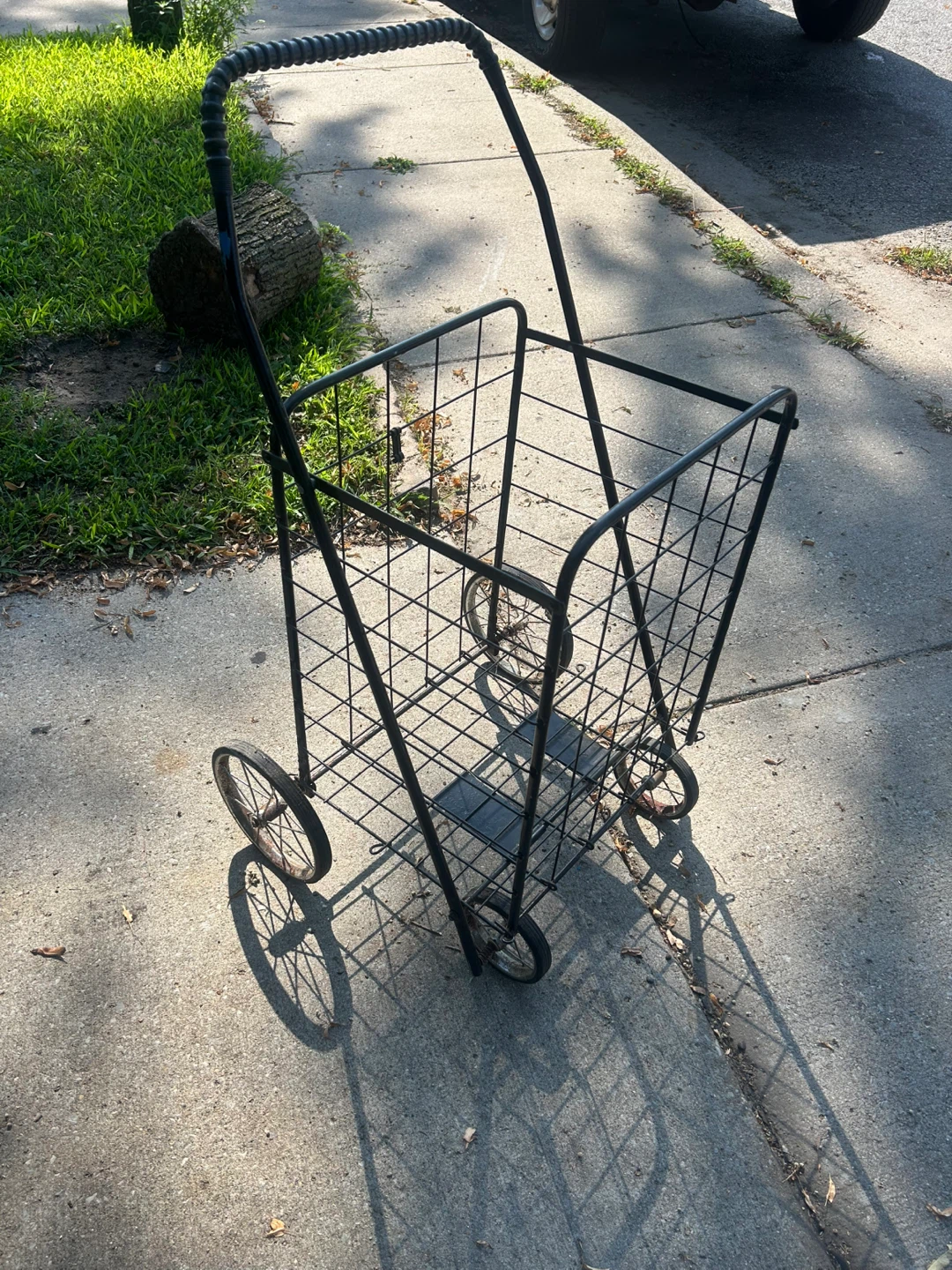 Black Metal Rolling Shopping Cart