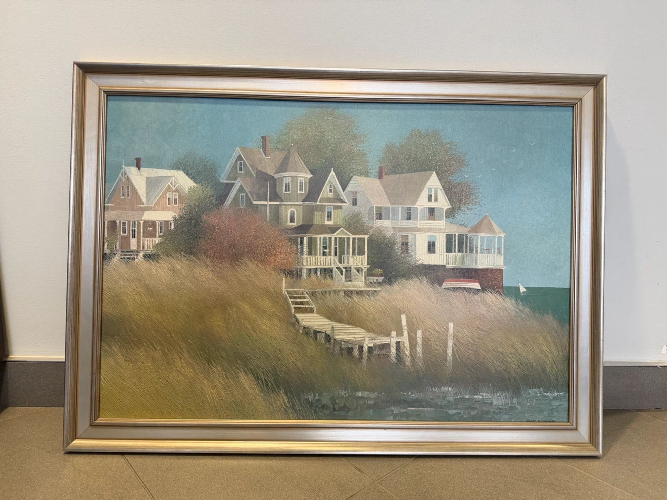 Framed Painting of Coastal Houses and Dock