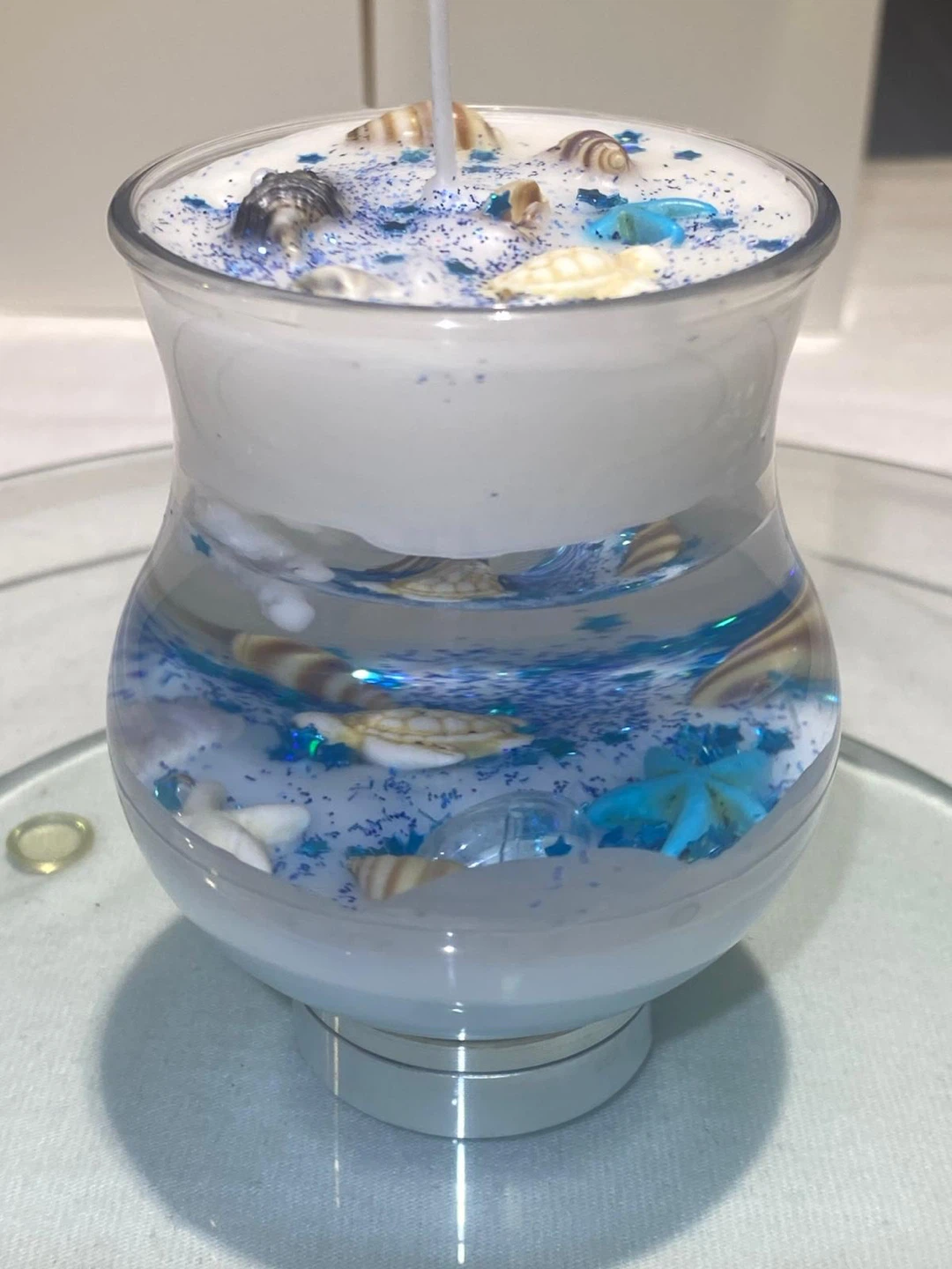 Handcrafted aquarium-themed candle in a glass container - photo 5