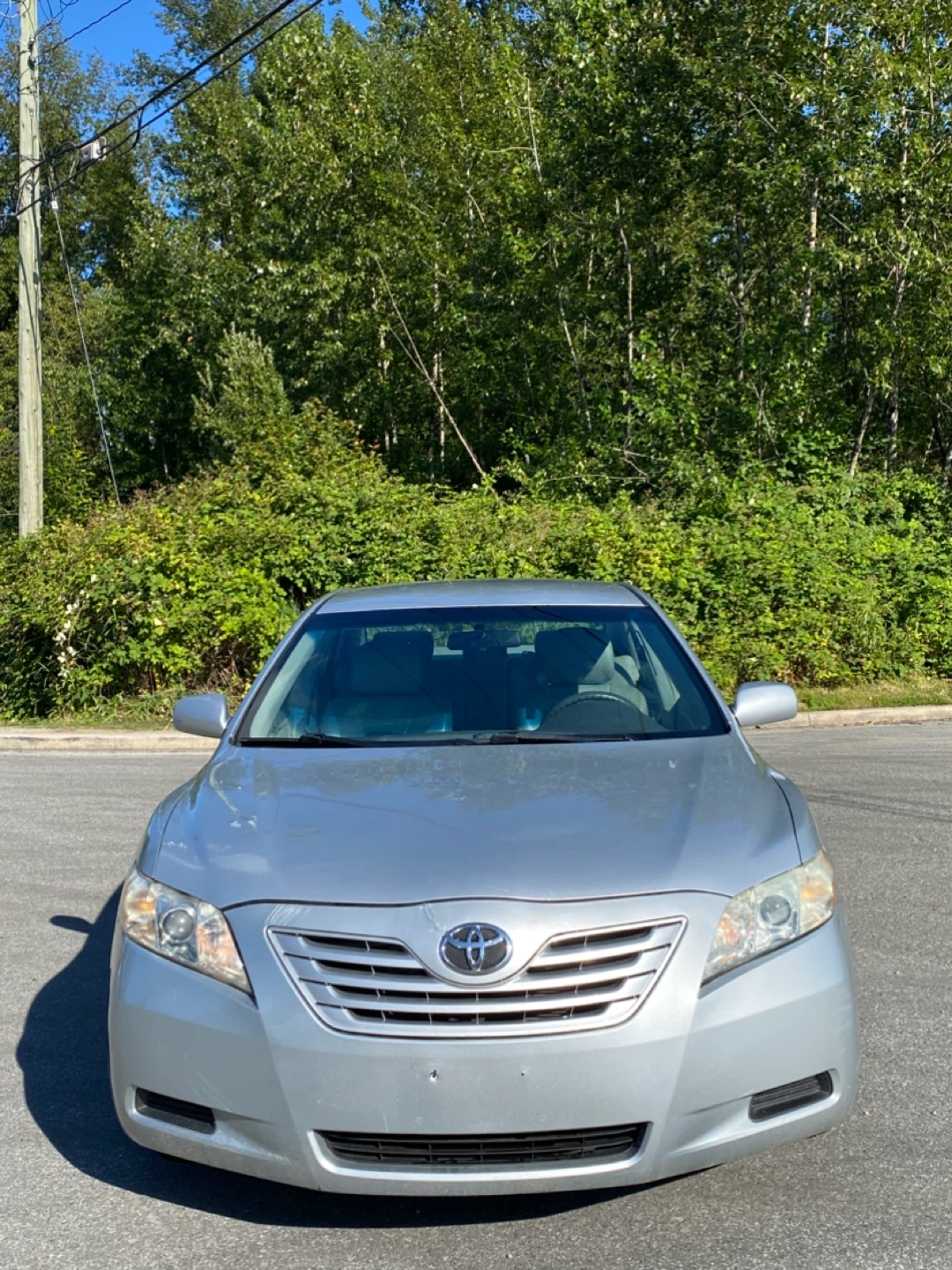 Silver Toyota Camry LE Sedan
