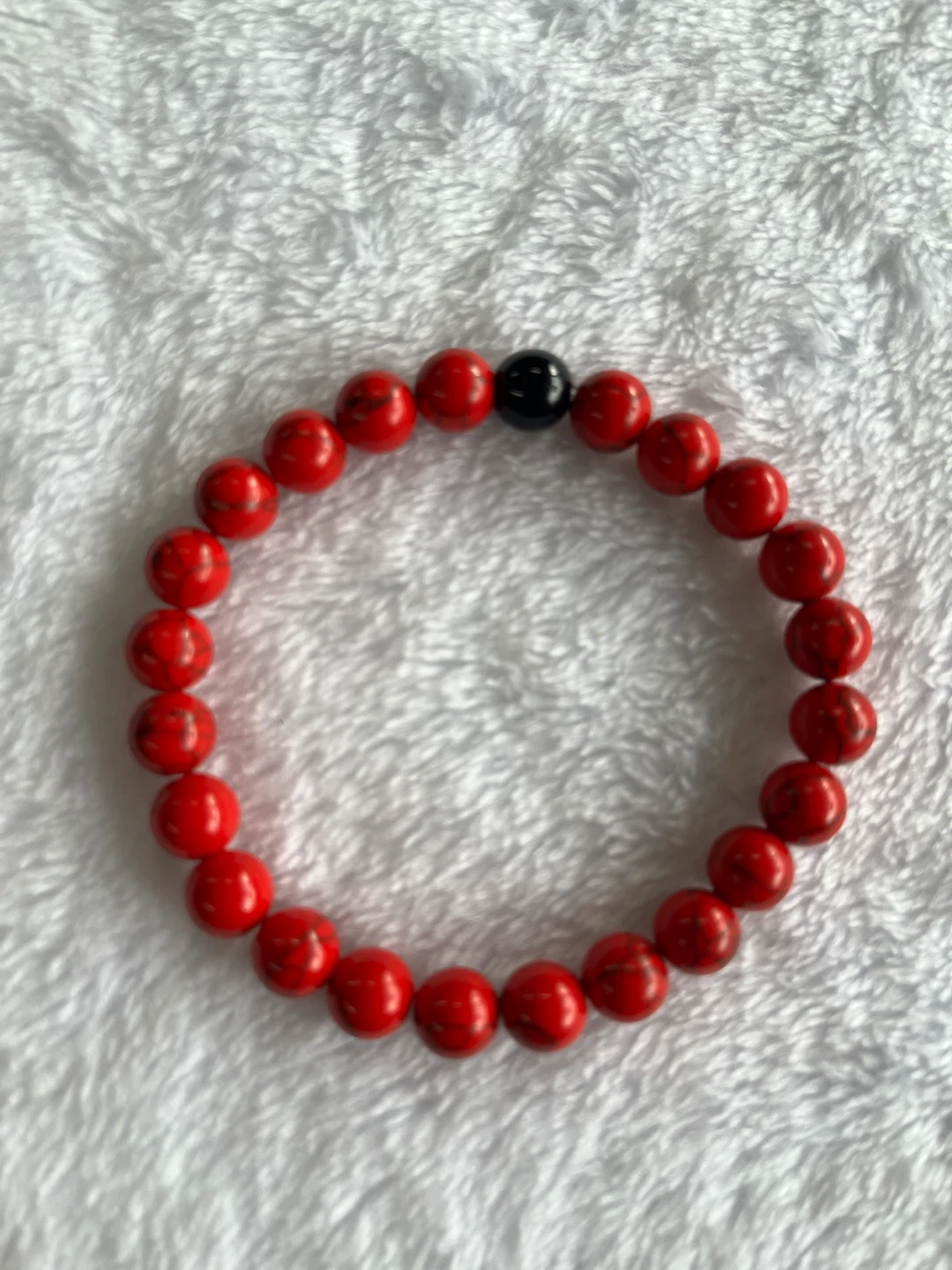 Red Beaded Bracelet with Black Accent Bead