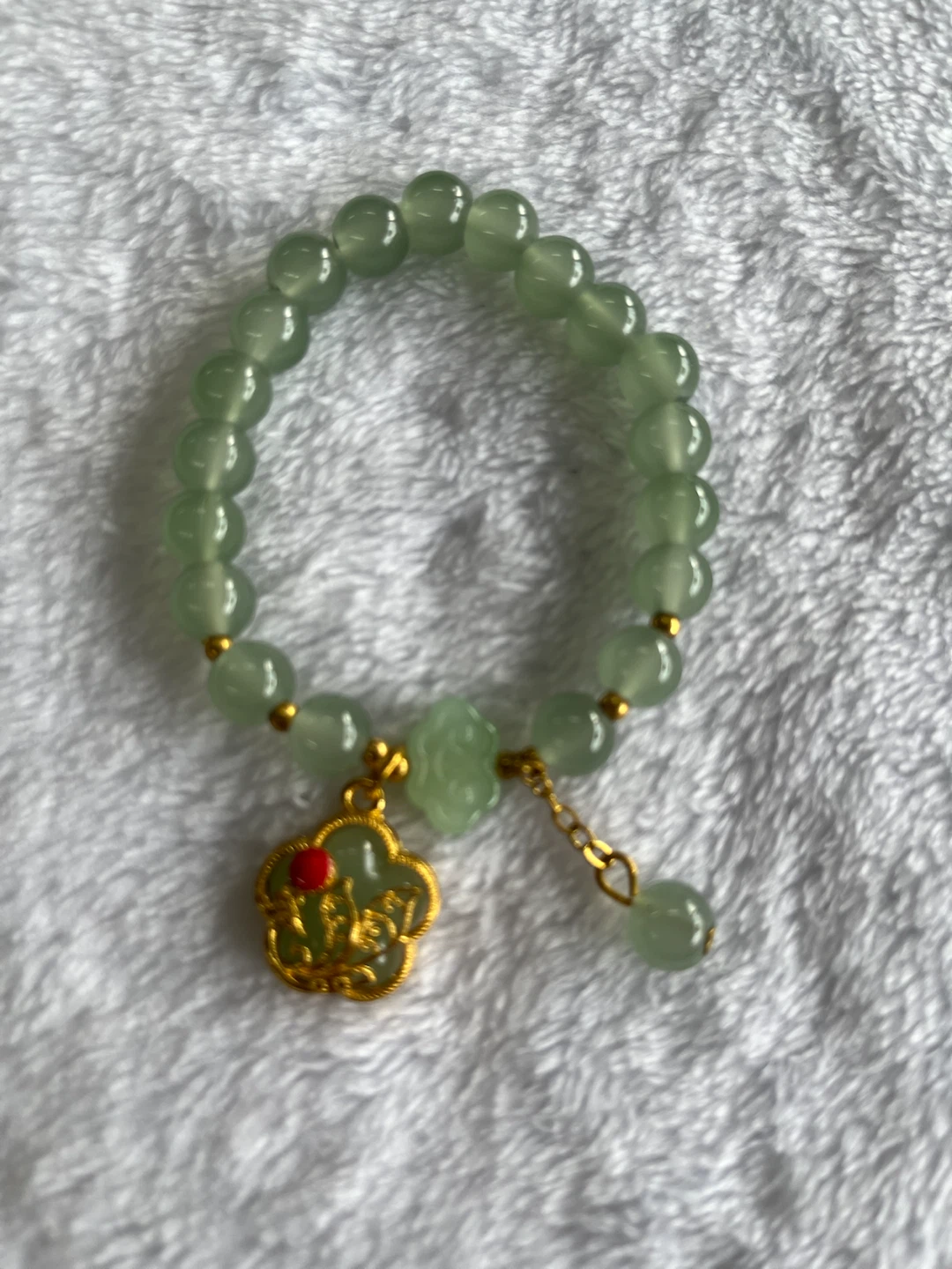 Light Green Beaded Bracelet with Gold Charm