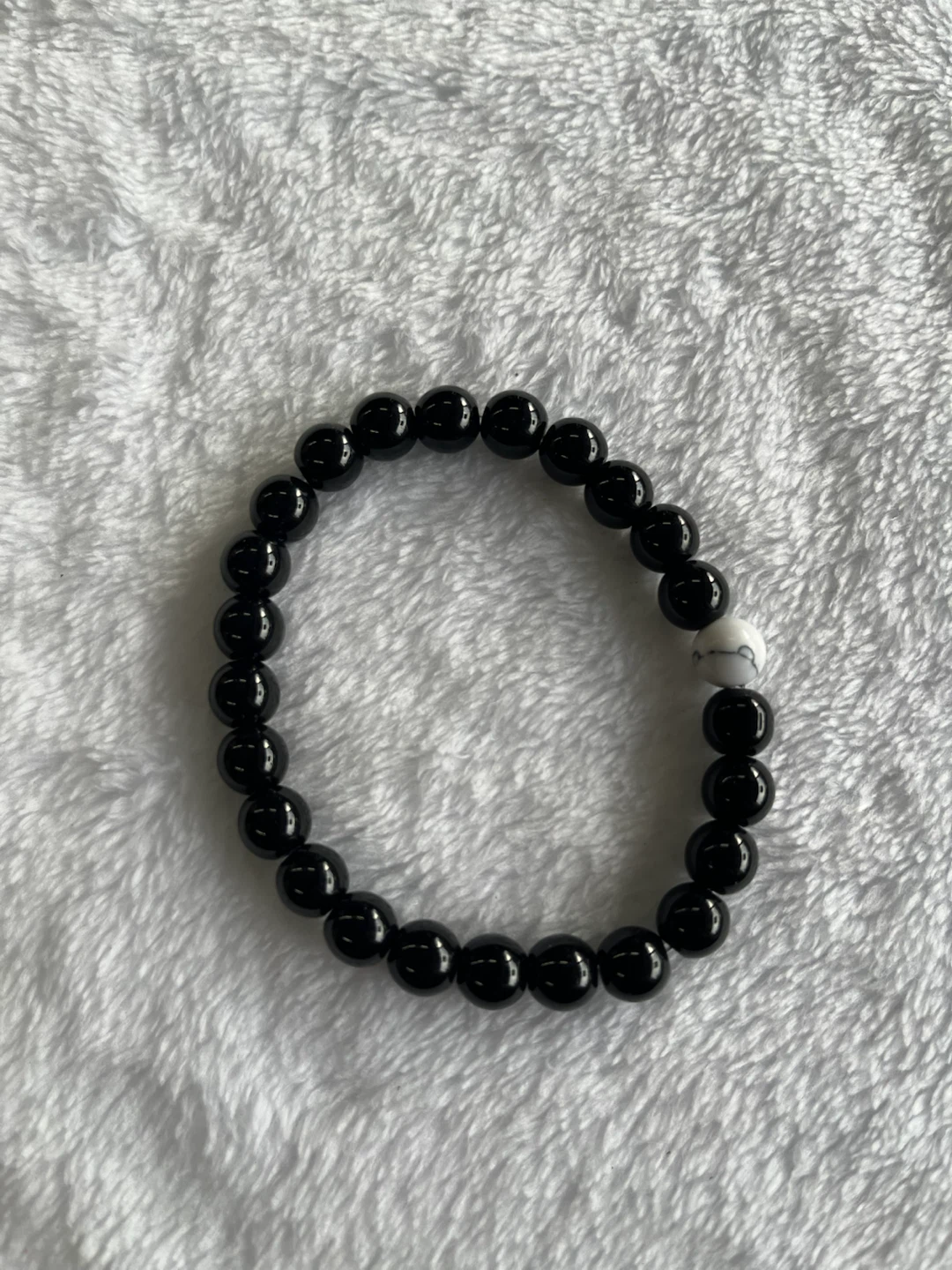 Black Beaded Bracelet with White Accent Bead