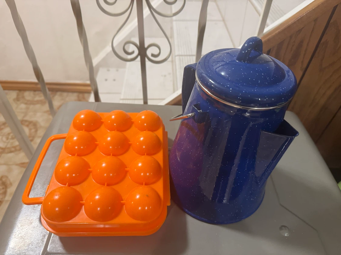 Blue Speckled Enamel Coffee Pot and Orange Egg Tray