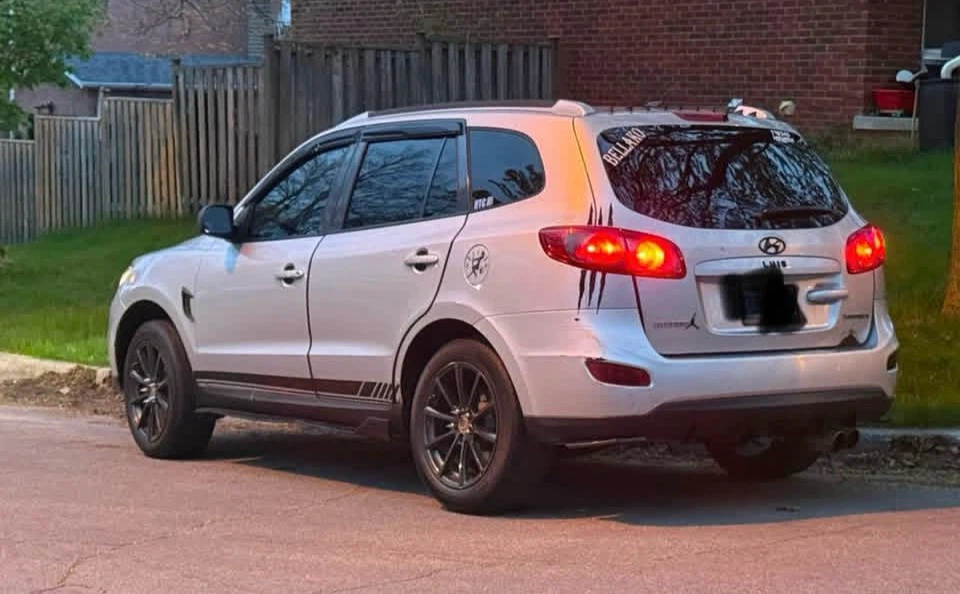 Silver Hyundai Santa Fe SUV - photo 2