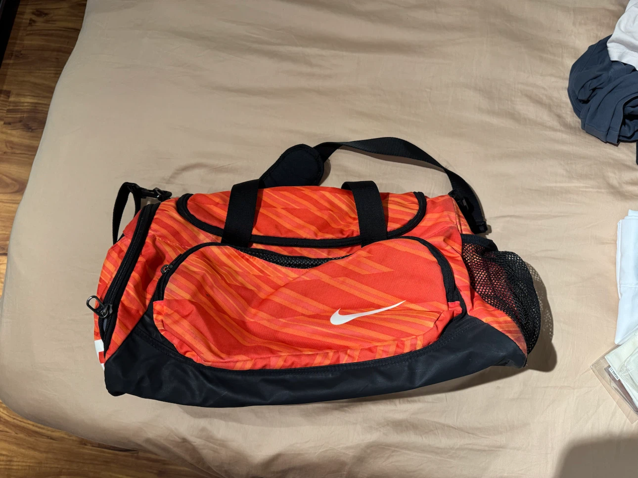Nike Orange Striped Duffel Bag