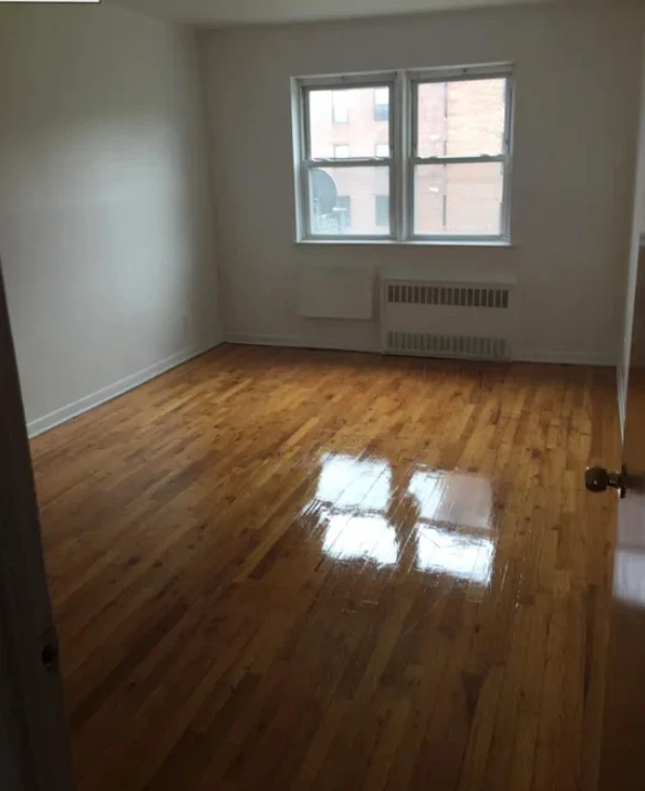 Empty Room with Hardwood Floors