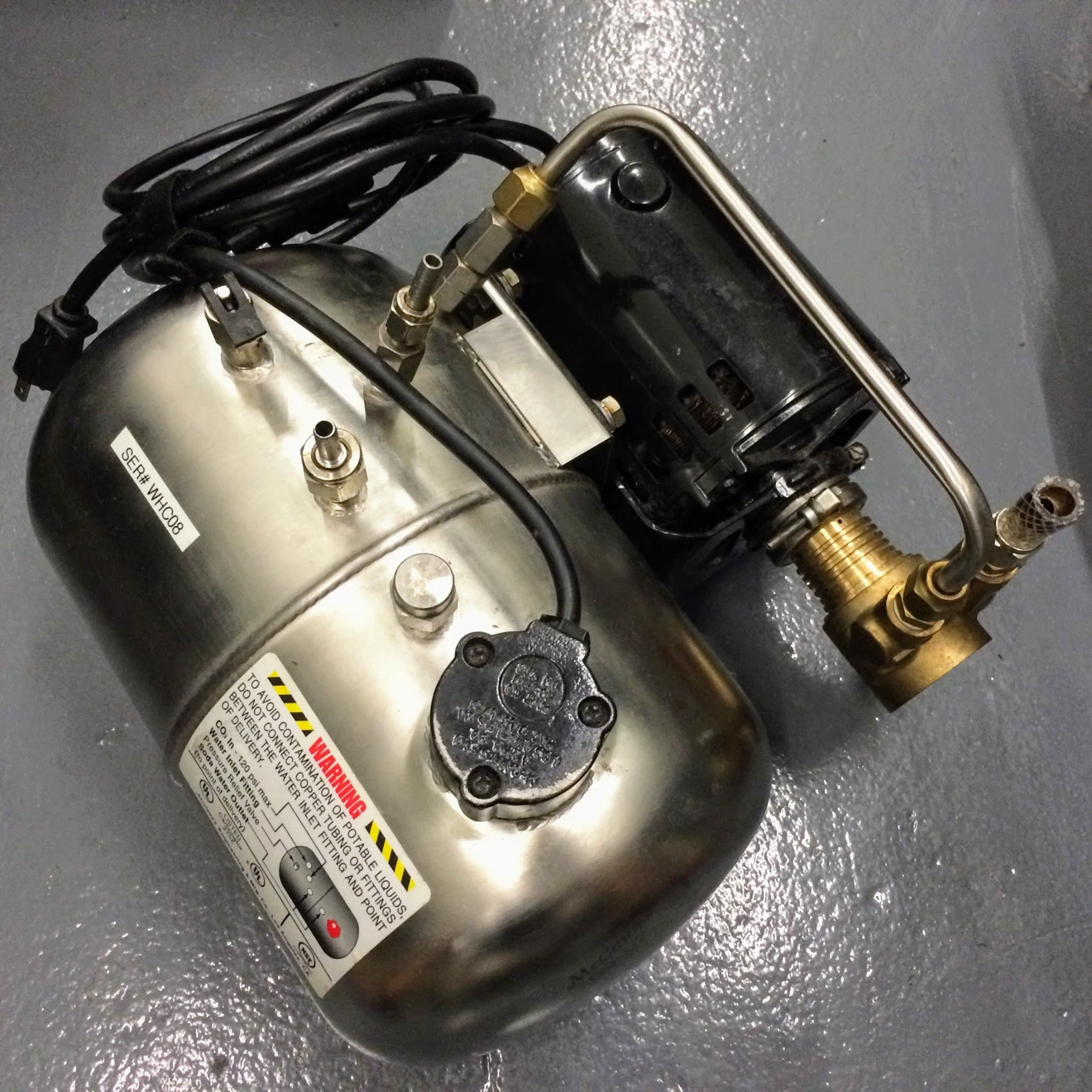 Water Dispenser Pump with Warning Label