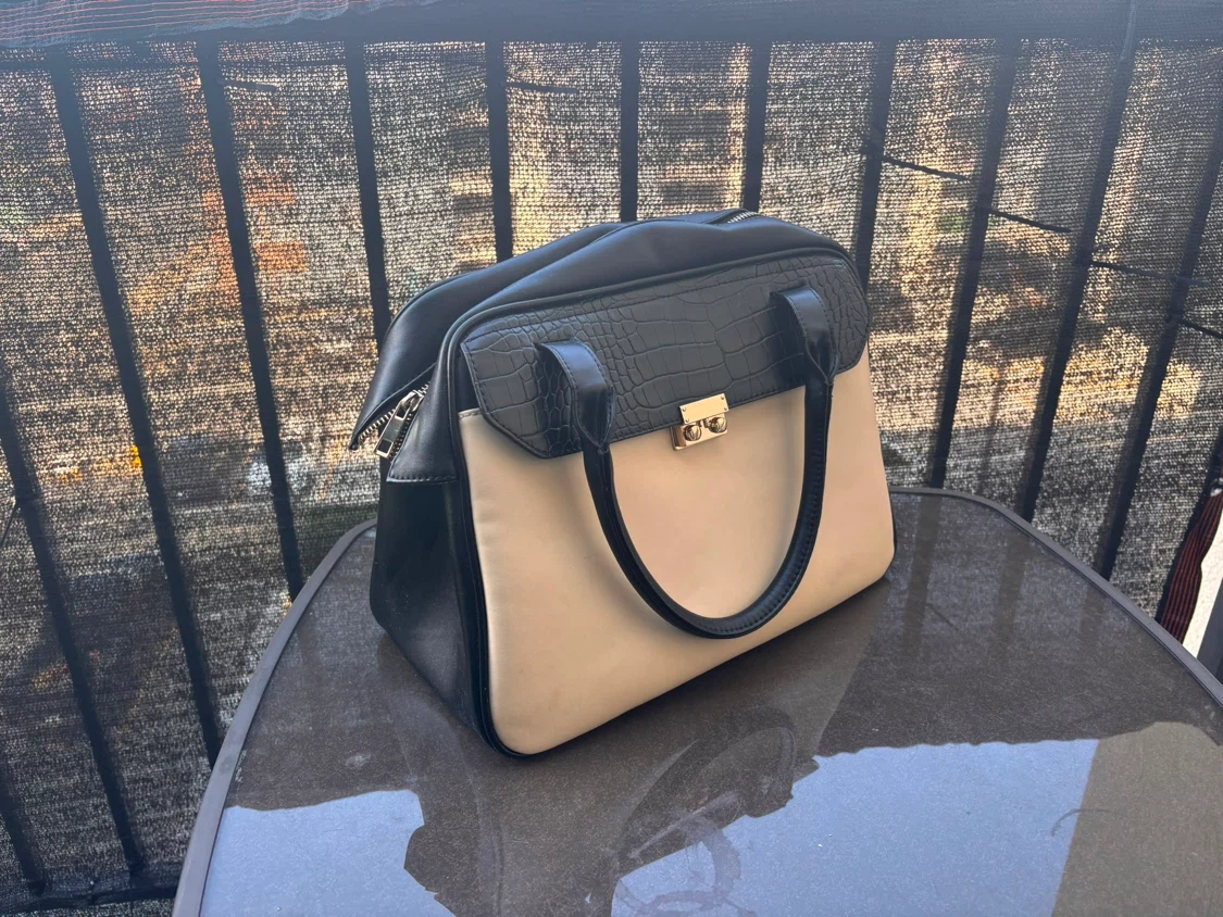 Black and beige handbag