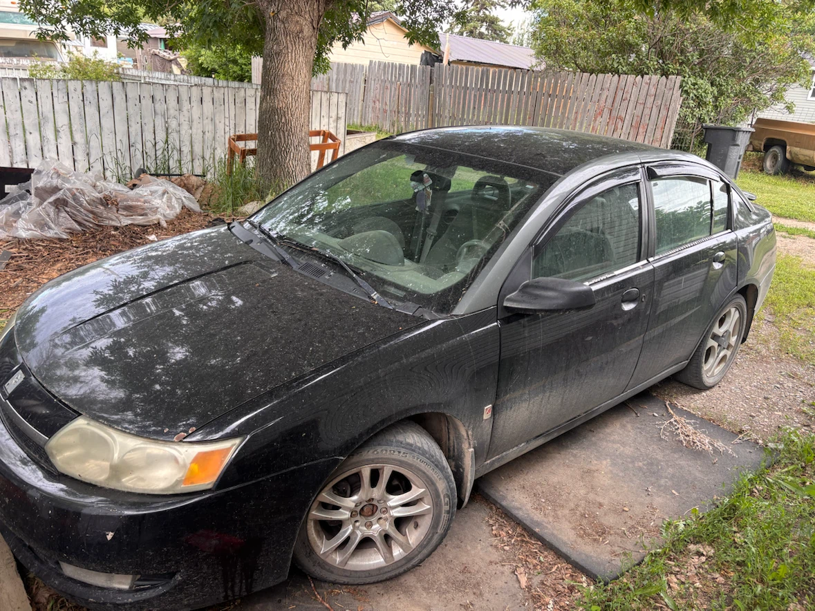 Black Saturn Ion Sedan 2003