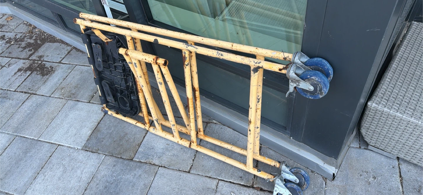 Yellow Metal Scaffolding with Wheels