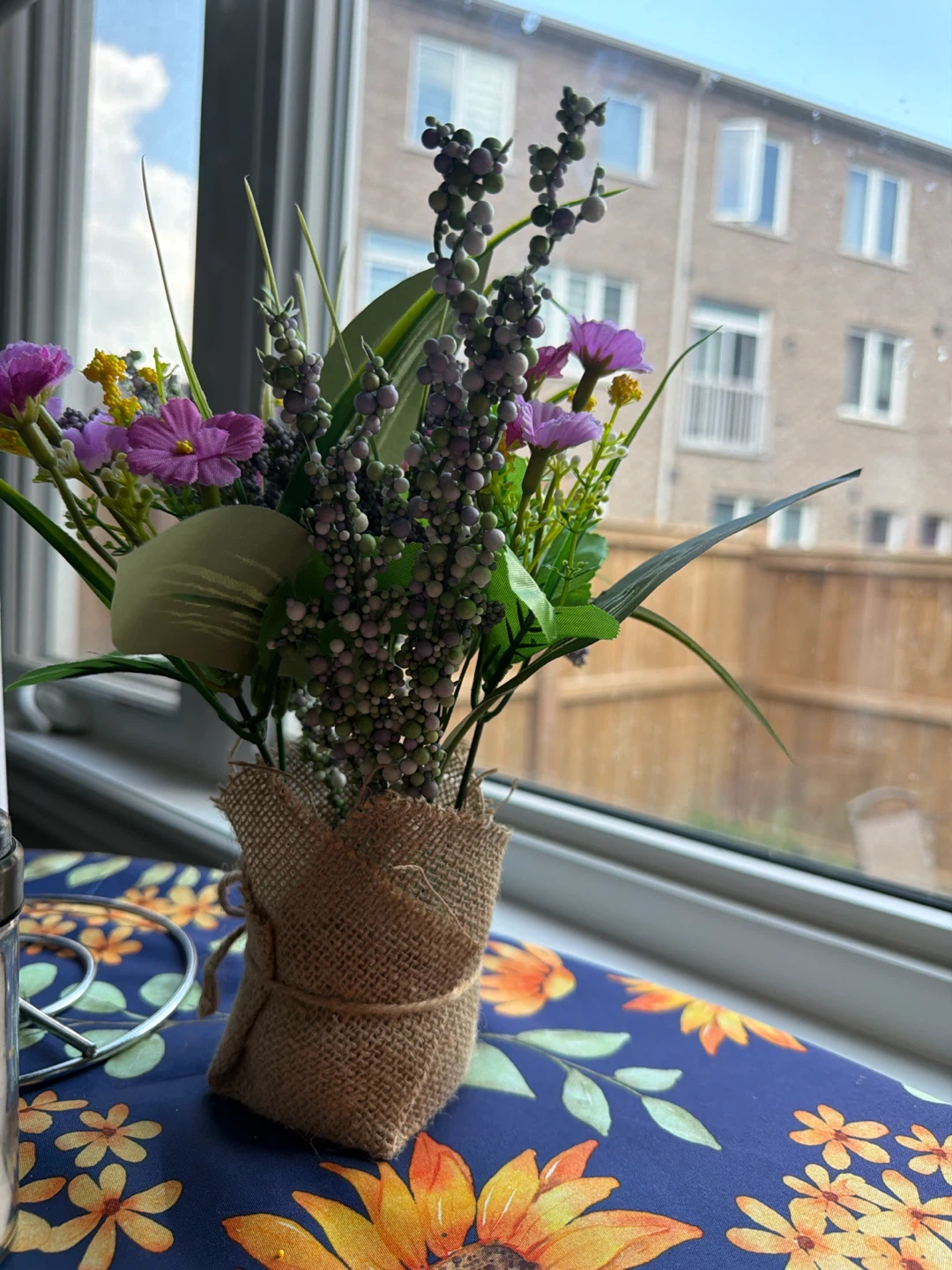 Artificial Flower Arrangement in Burlap Vase