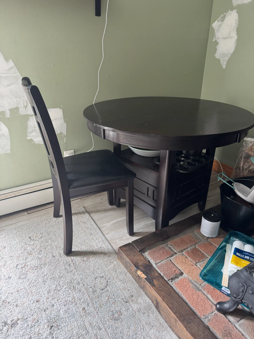 Dark wood round table and four chairs
