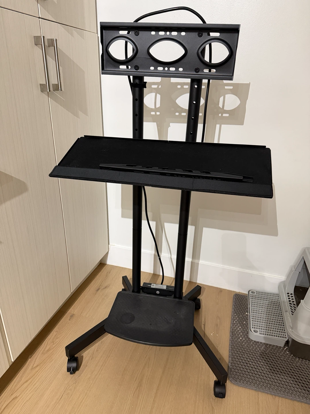 Black Mobile TV Stand with Shelf and Power Strip - photo 2
