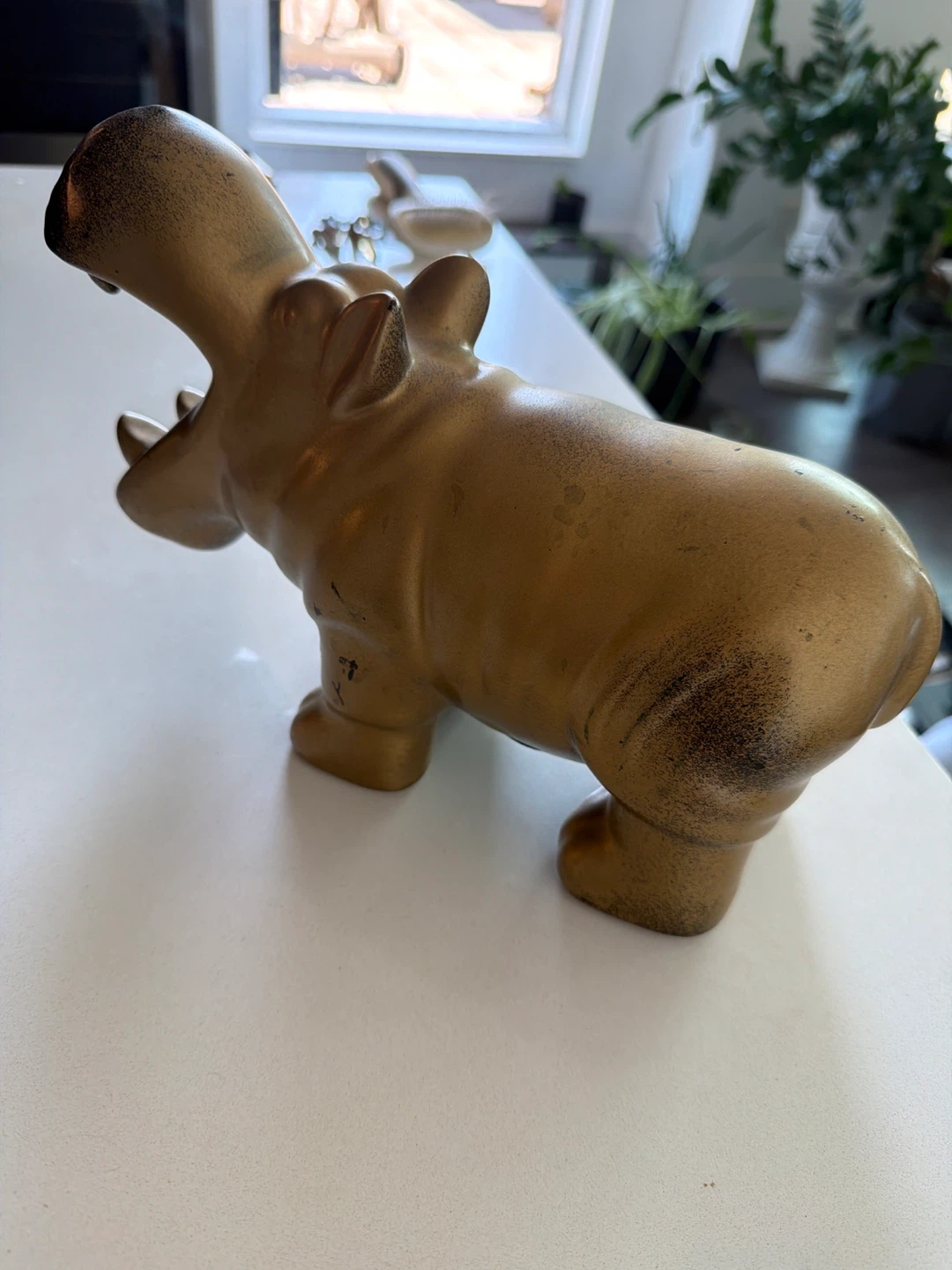 Gold Hippo change collector
