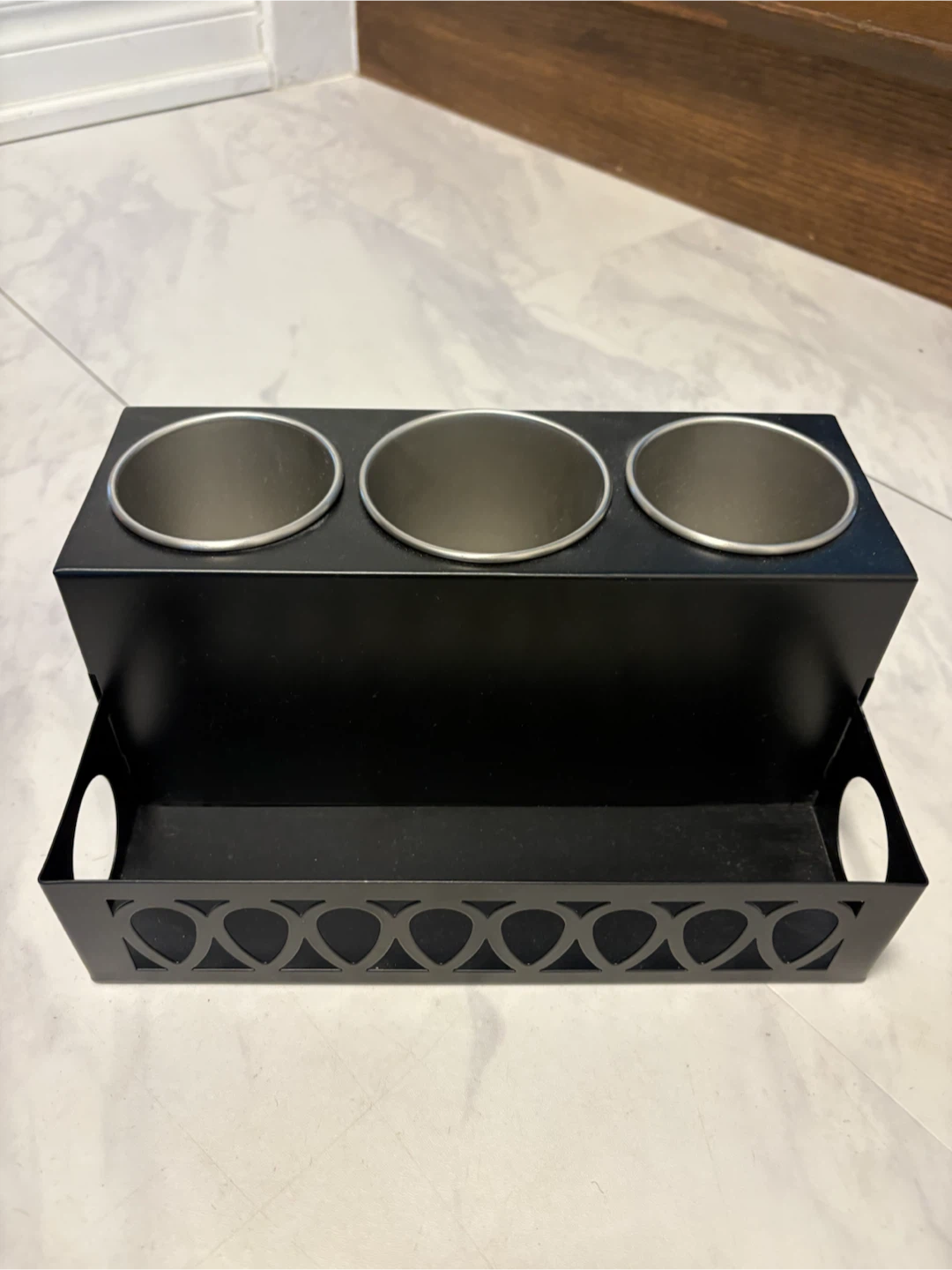 Black metal hair tool caddy with 3 cups