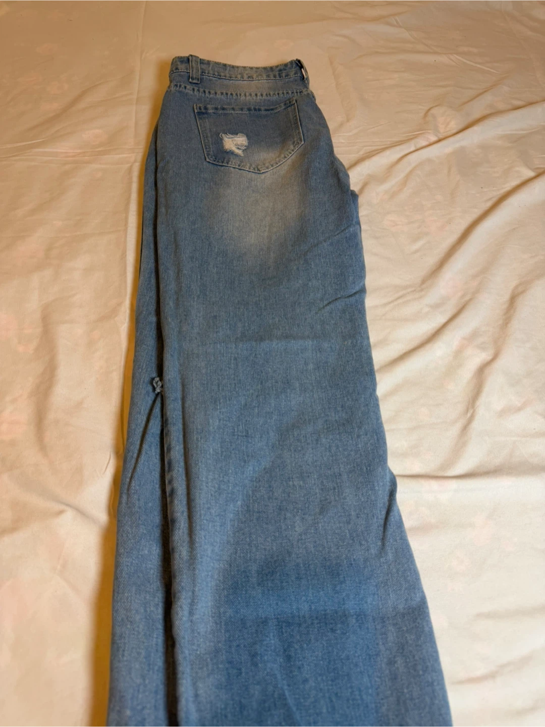 Women's Ripped Light Wash Jeans - photo 3