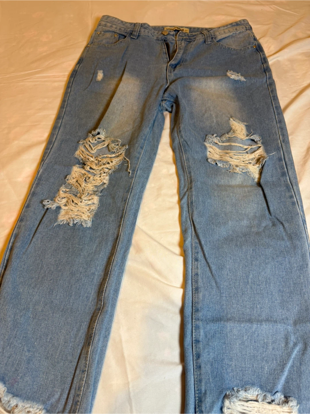 Women's Ripped Light Wash Jeans - photo 2