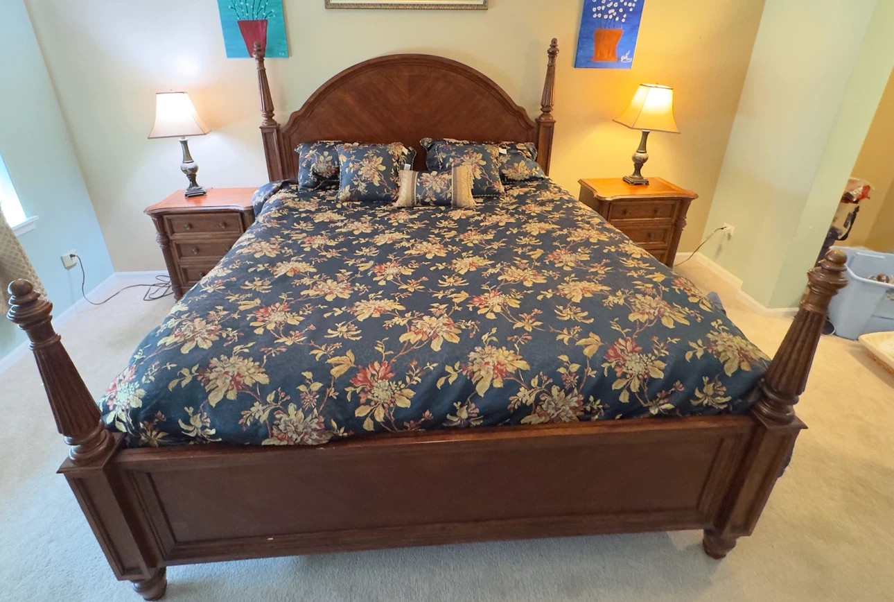 King size poster bed frame with 2 night stands.