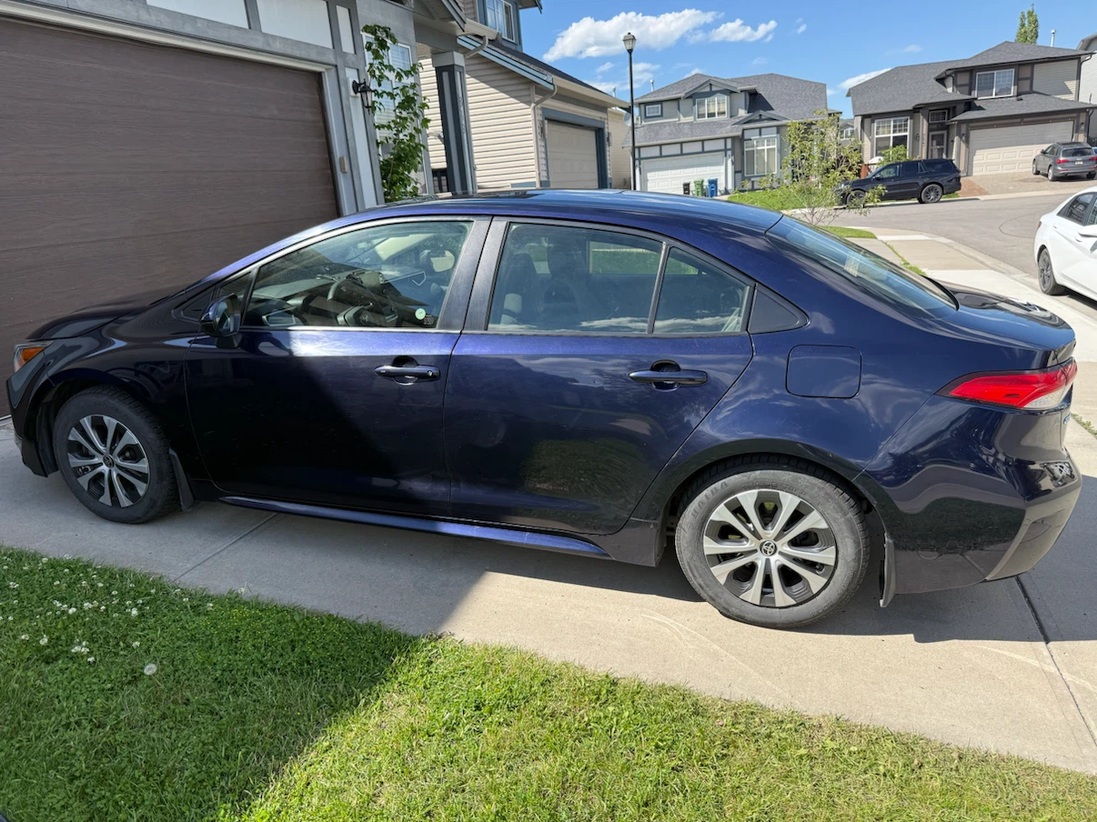 Dark Blue Toyota Corolla Sedan - photo 3