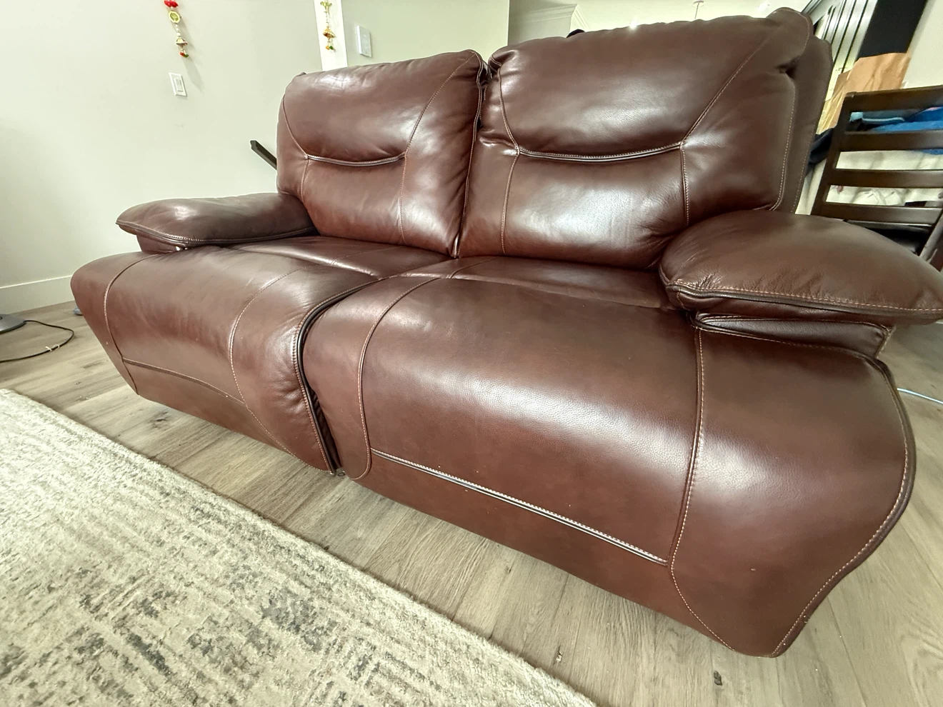 Brown Leather Reclining Sofa and love seat
