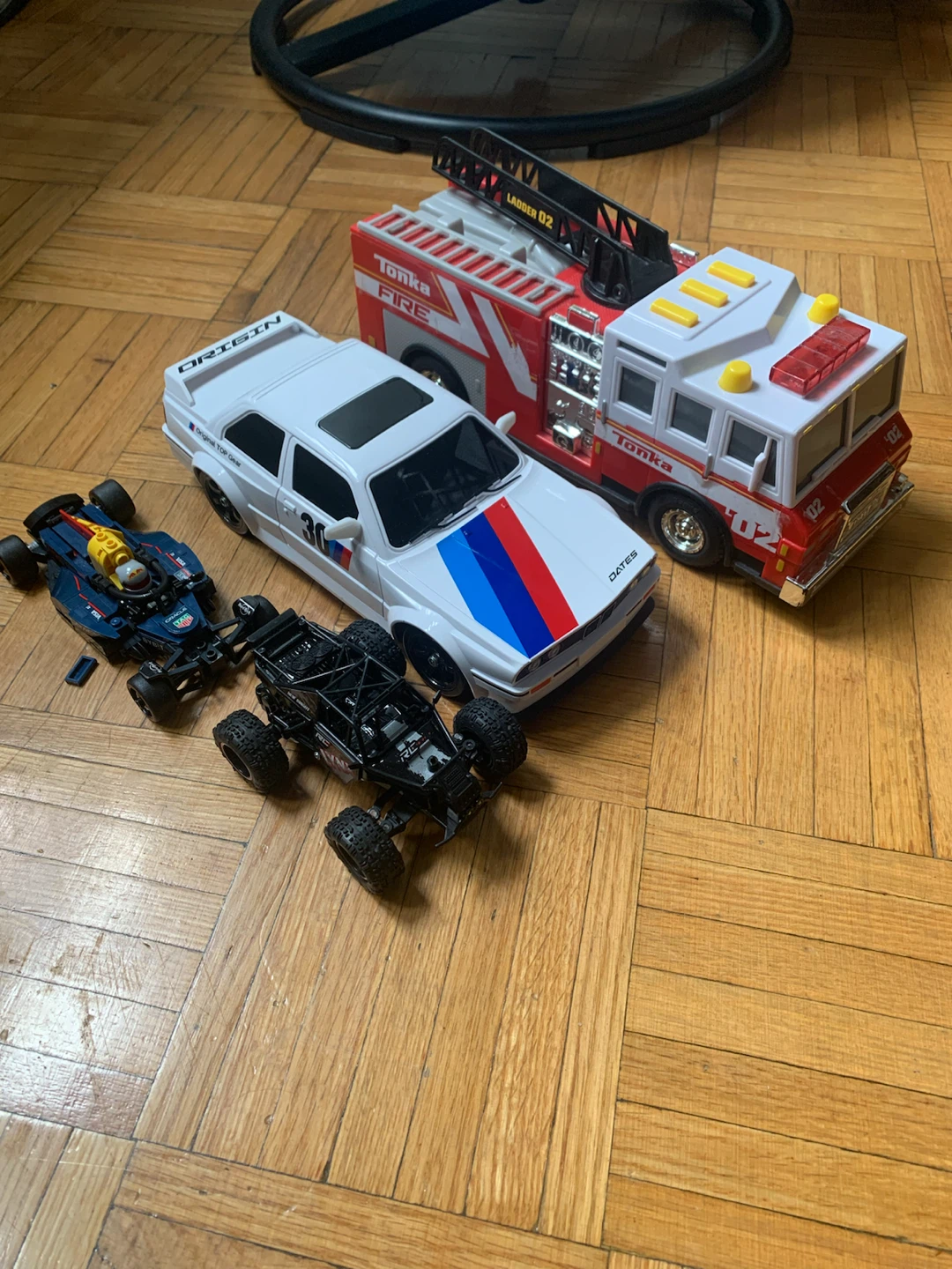 Assorted Toy Cars and Fire Truck