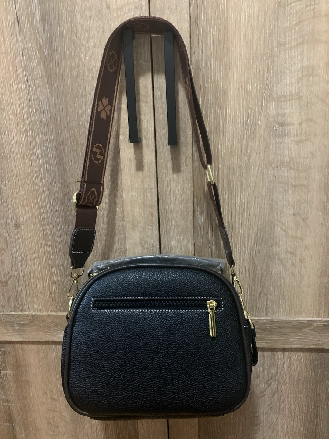 Black crossbody bag with patterned strap - photo 2