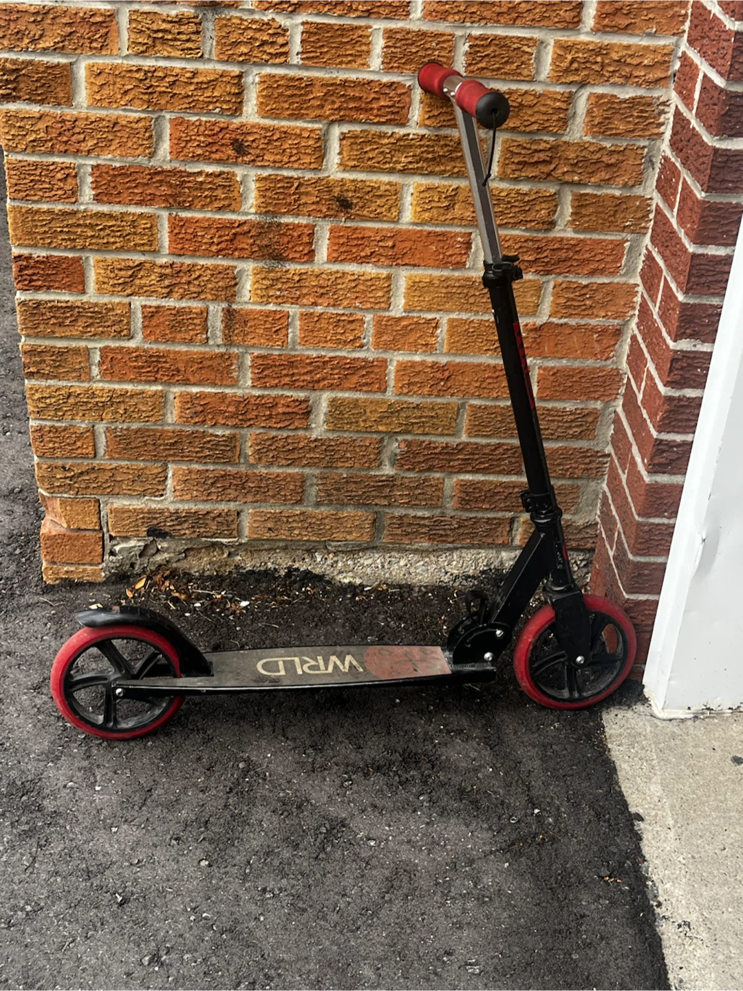 WRLD Scooter with Red Accents