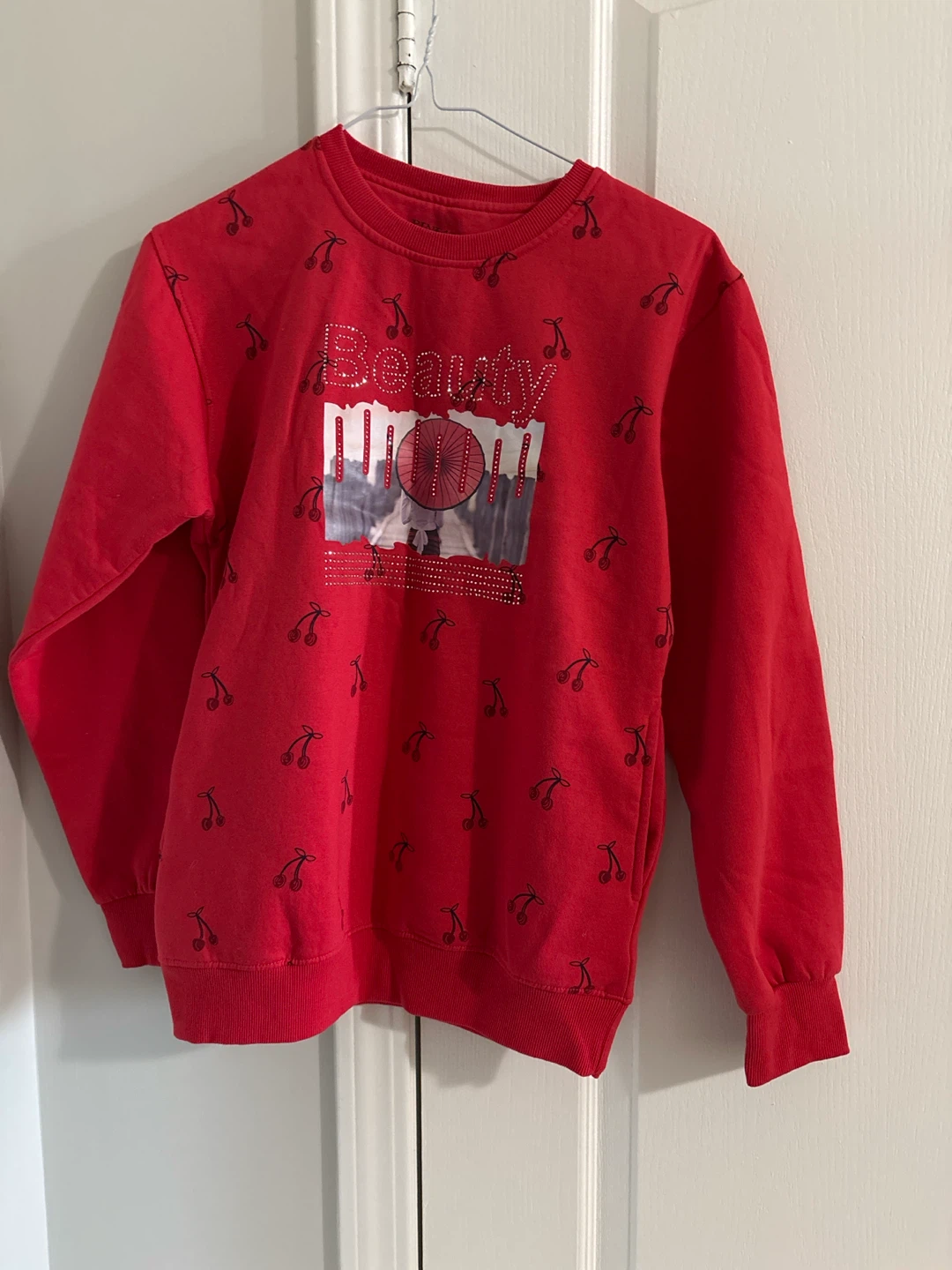 Red Cherry Print Sweatshirt with "Beauty" Graphic