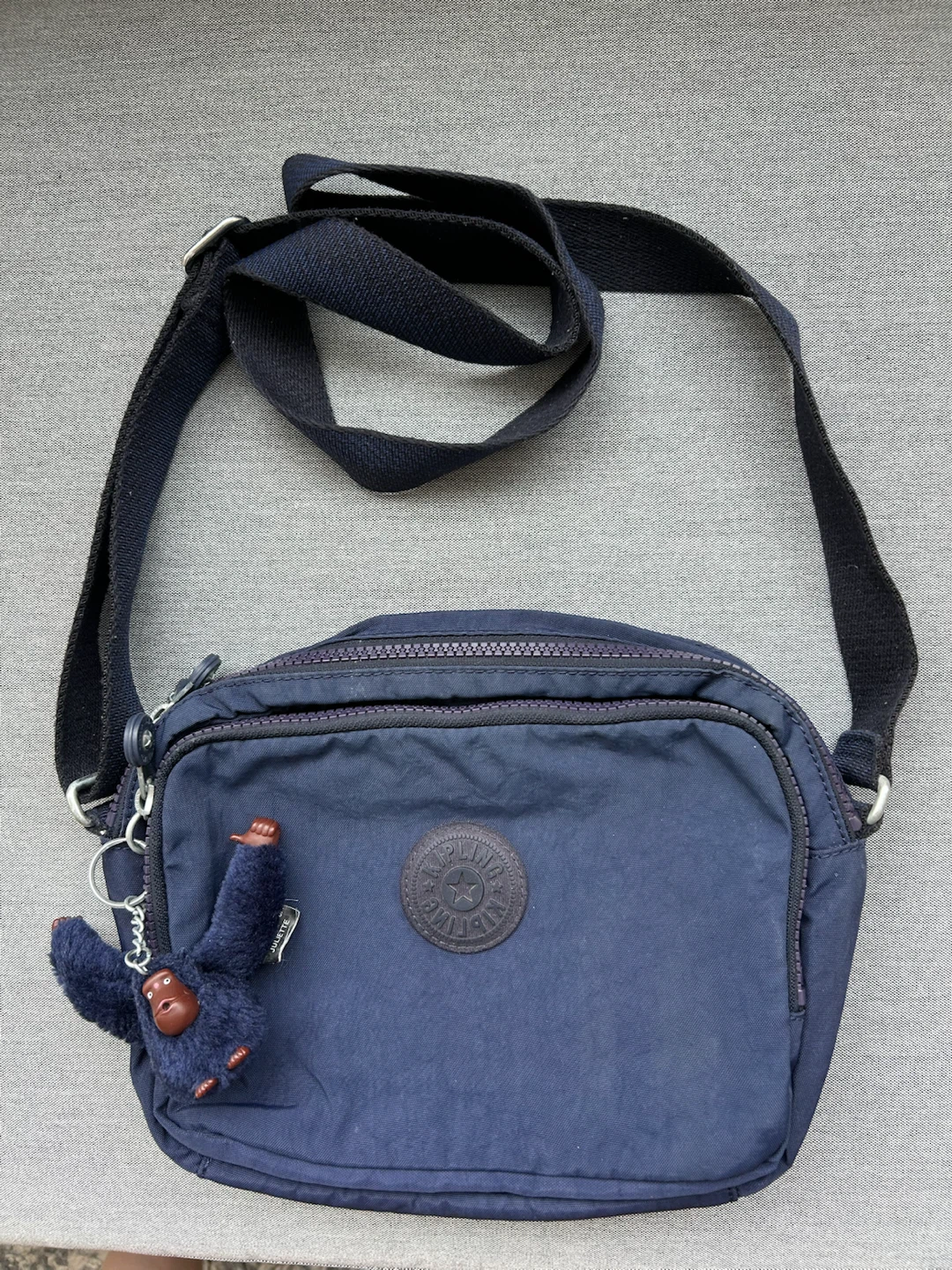 Kipling Navy Blue Crossbody Bag with Monkey Charm